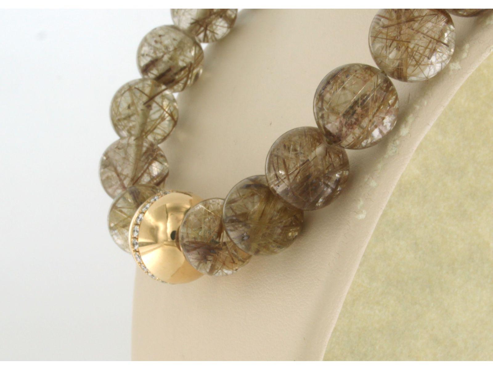 Claps with diamonds on a rock crystal rutile inclusions bead necklace 18k gold In Excellent Condition For Sale In The Hague, ZH