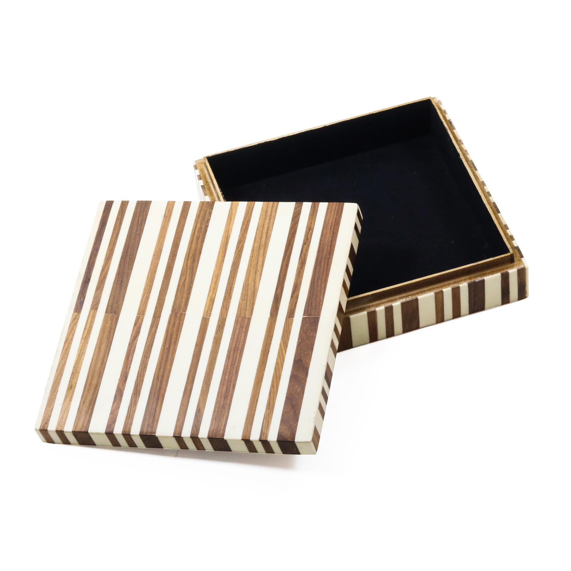 A square brown and cream decorative resin box featuring a striped pattern of varying thicknesses.
      