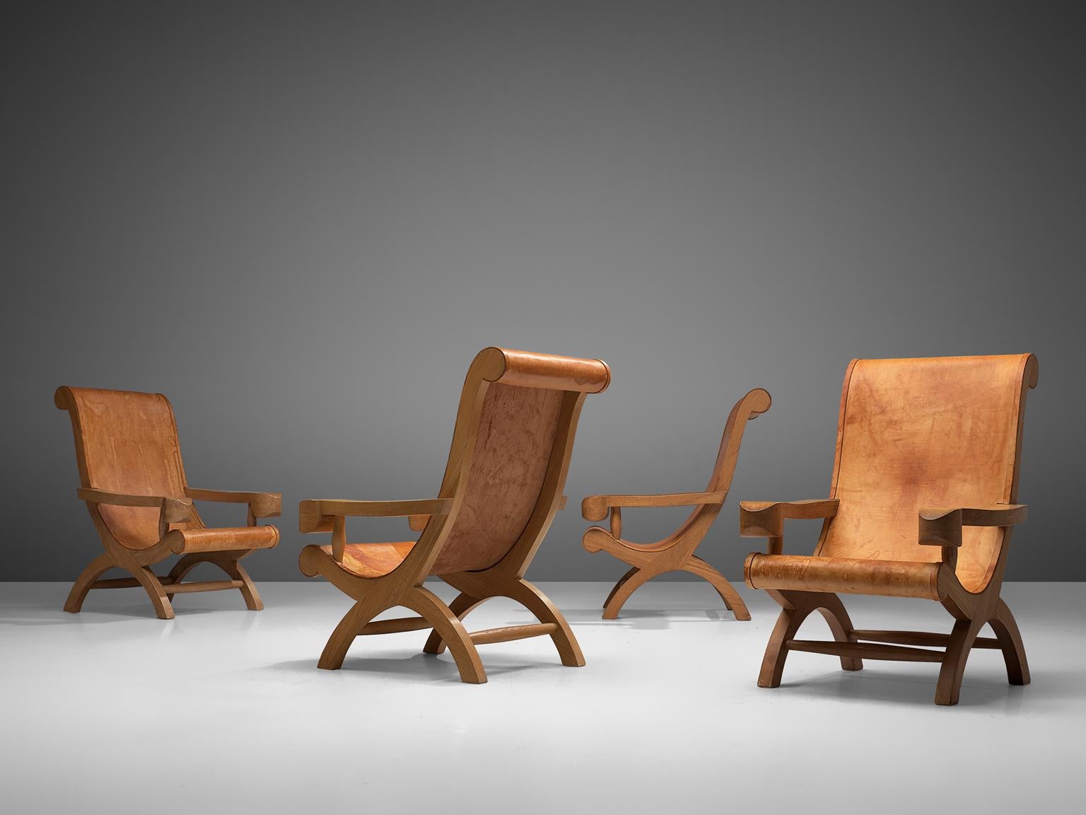 Clara Porset, 4 'Butaque' armchairs, leather and cypress wood, Mexico, circa 1947.

Wonderful set of Butaque chairs designed by Clara Porset. These chairs have an exotic look, due to Porset's combination of Modern desgin with Mexican