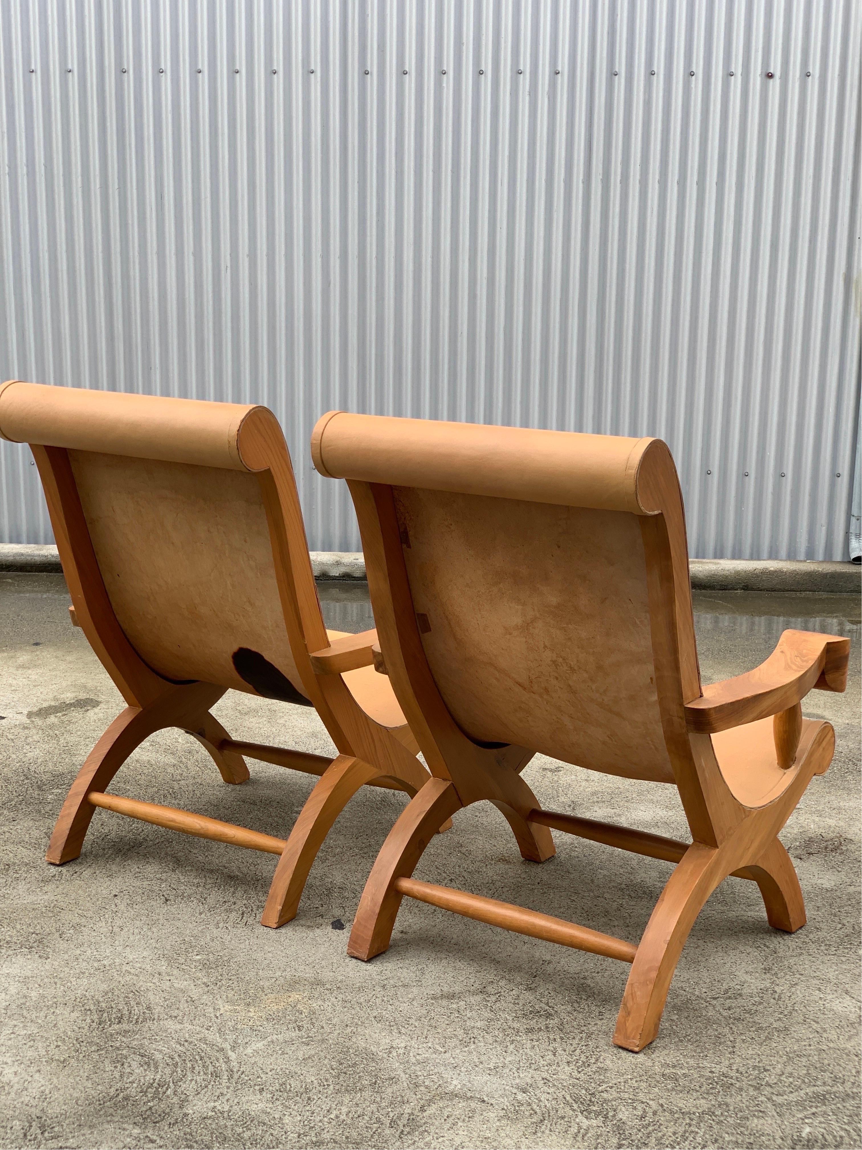 Pair of iconic arm lounge chairs by Clara Porset from an architect, really significant building designed by Ricardo Legarreta architect located in Emeryville, California.