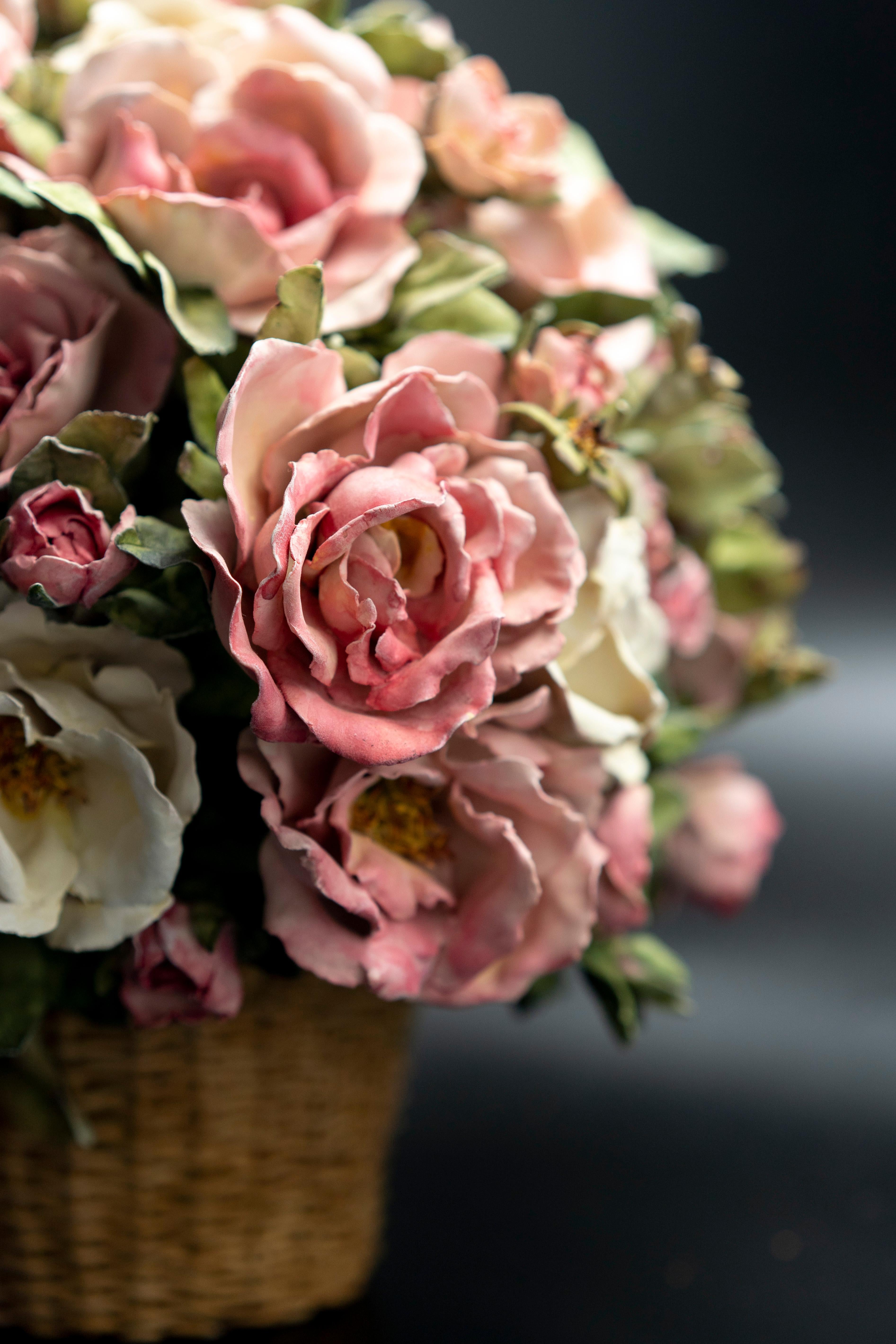 Clare potter porcelain basket with pink and cream roses. Measures: 12
