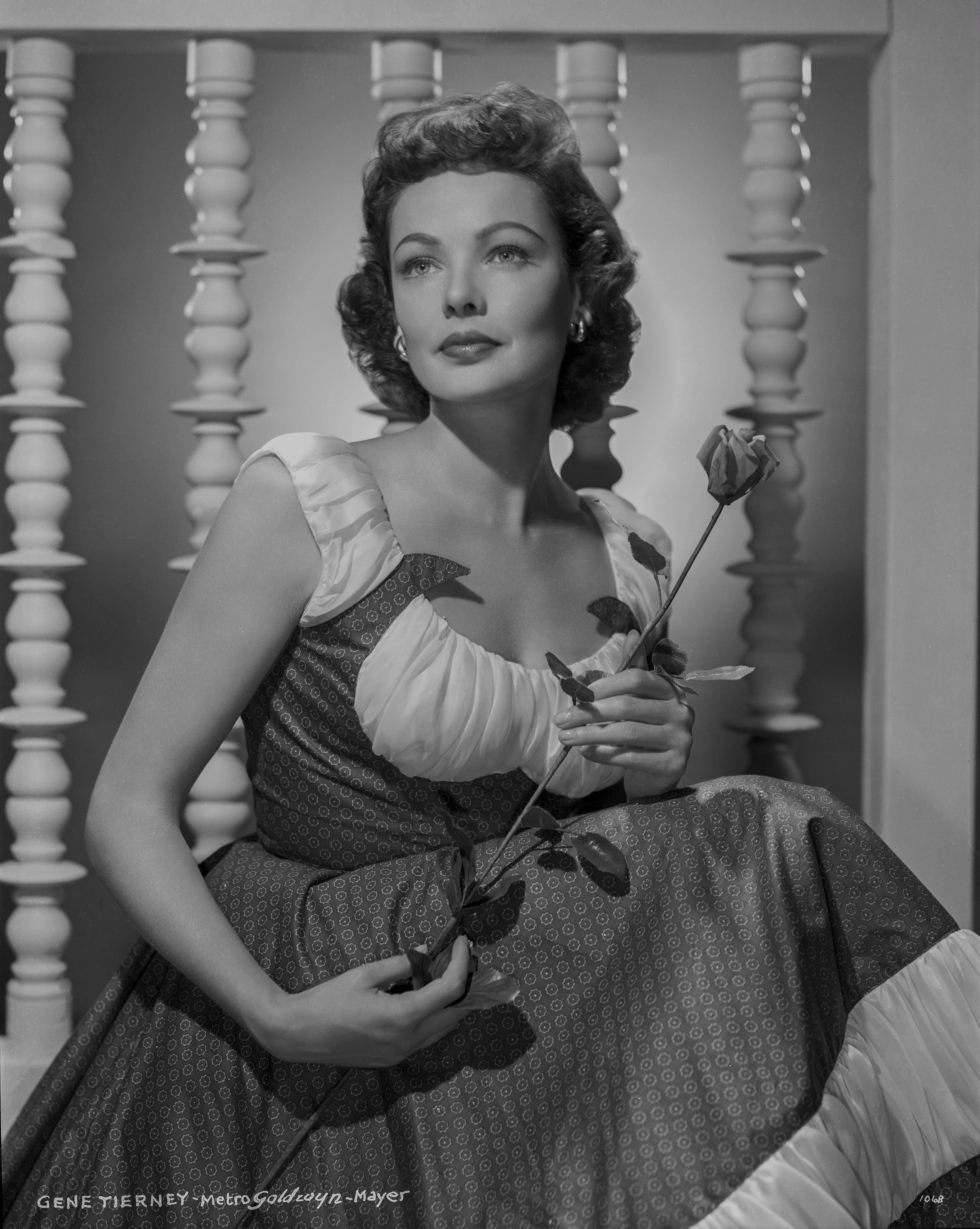 Clarence Sinclair Bull Black and White Photograph - Gene Tierney Holding Rose Fine Art Print