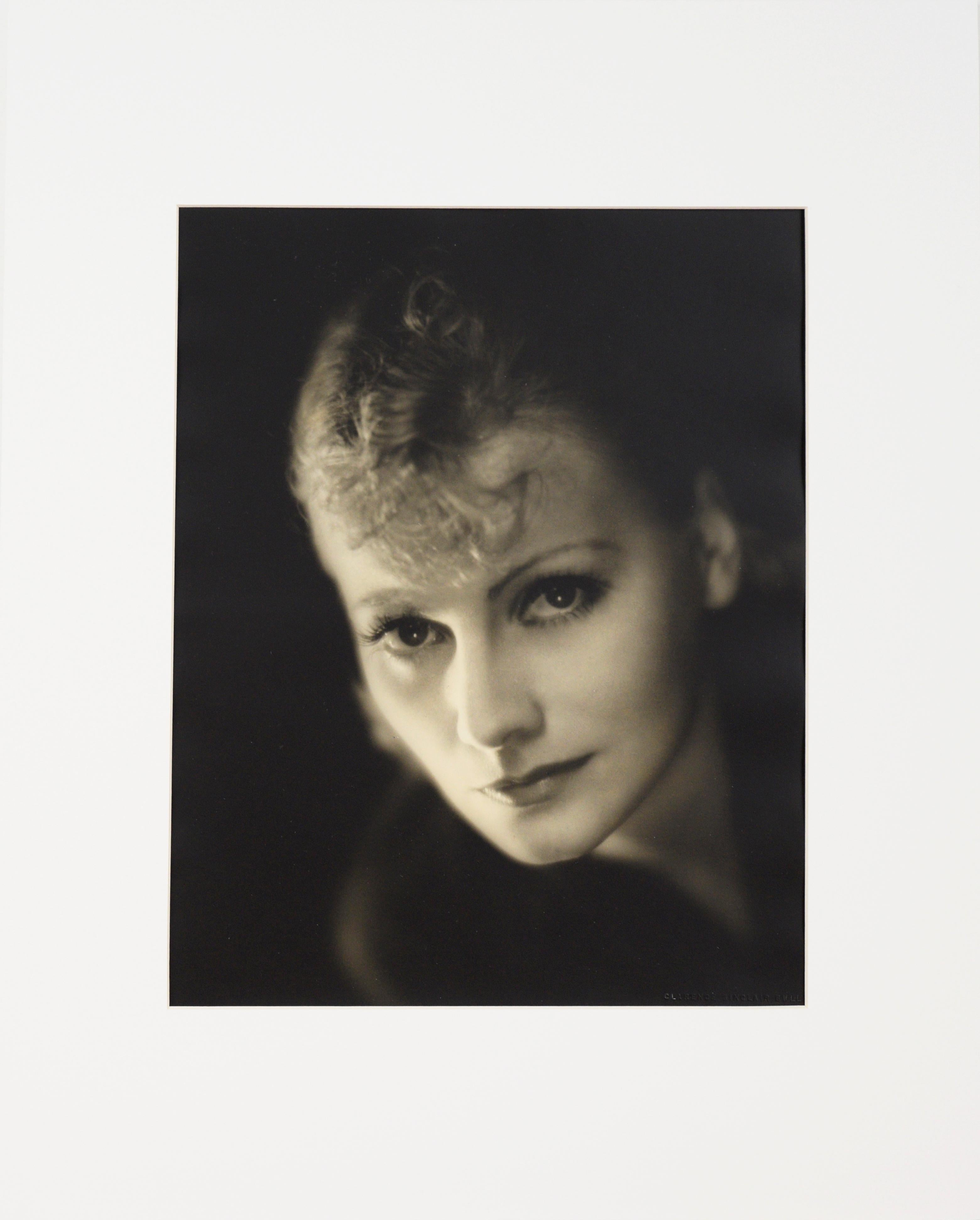 Greta Garbo - Somber Head Shot by Clarence Sinclair Bull, 1931

1931 Black and white somber headshot photograph of Swedish/American actress Greta Garbo (Swedish, 1905-1990) by Clarence Sinclair Bull (American, 1896-1979). Greta Garbo gazes at the