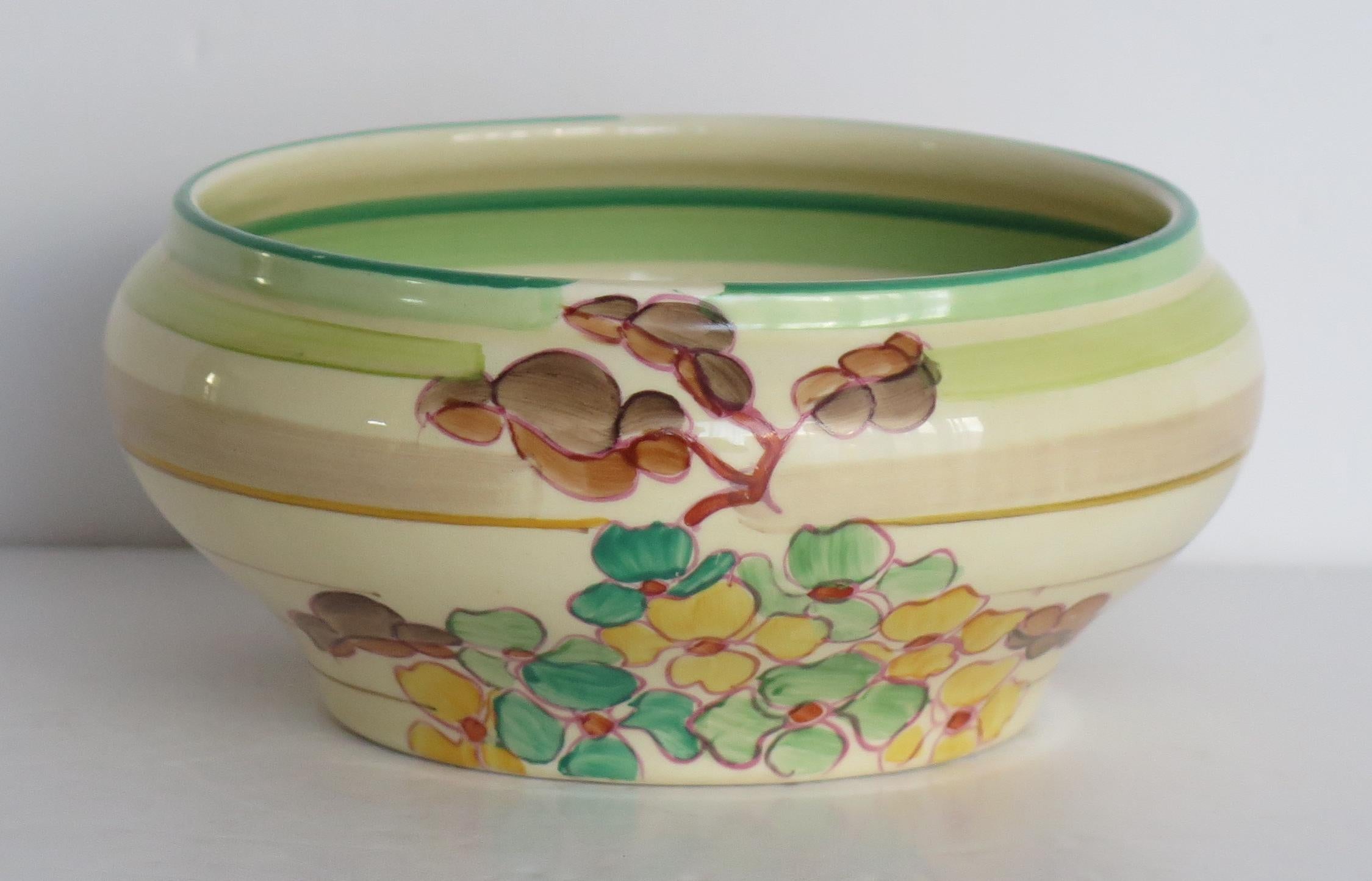 This is a bowl by Clarice Cliff in the 