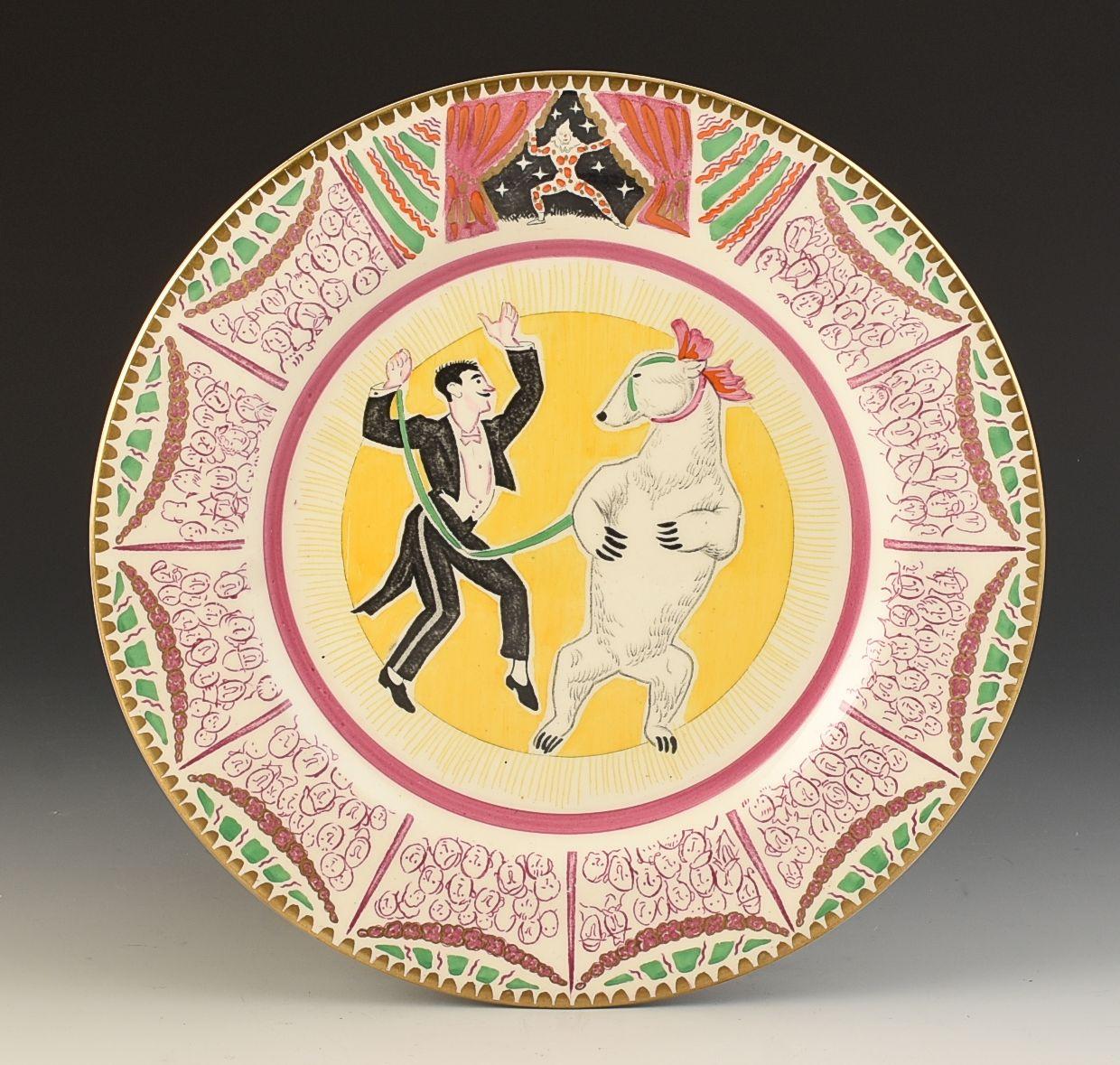 A rare plate designed by Laura Knight for the Harrods 'Art in Industry ' exhibition of 1934. These plates and various tablewares were made for the ''Modern art for the table'' section where current artists of the time were invited to design for the