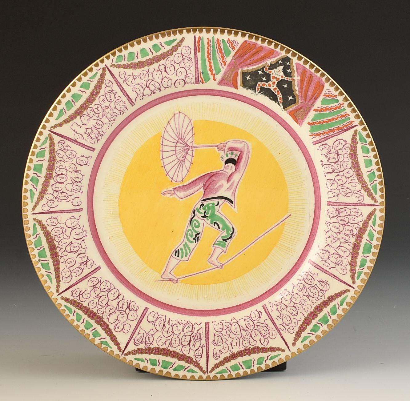 A rare plate designed by Laura Knight for the Harrods 'Art in Industry ' exhibition of 1934. These plates and various tablewares were made for the ''Modern art for the table'' section where current artists of the time were invited to design for the