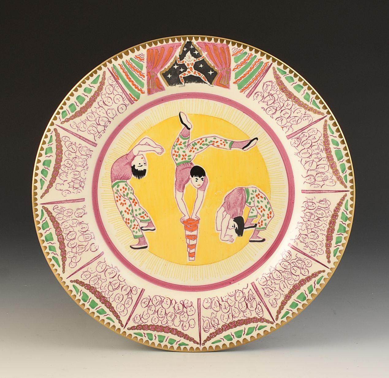A rare plate designed by Laura Knight for the Harrods 'Art in Industry ' exhibition of 1934. These plates and various tablewares were made for the ''Modern art for the table'' section where current artists of the time were invited to design for the