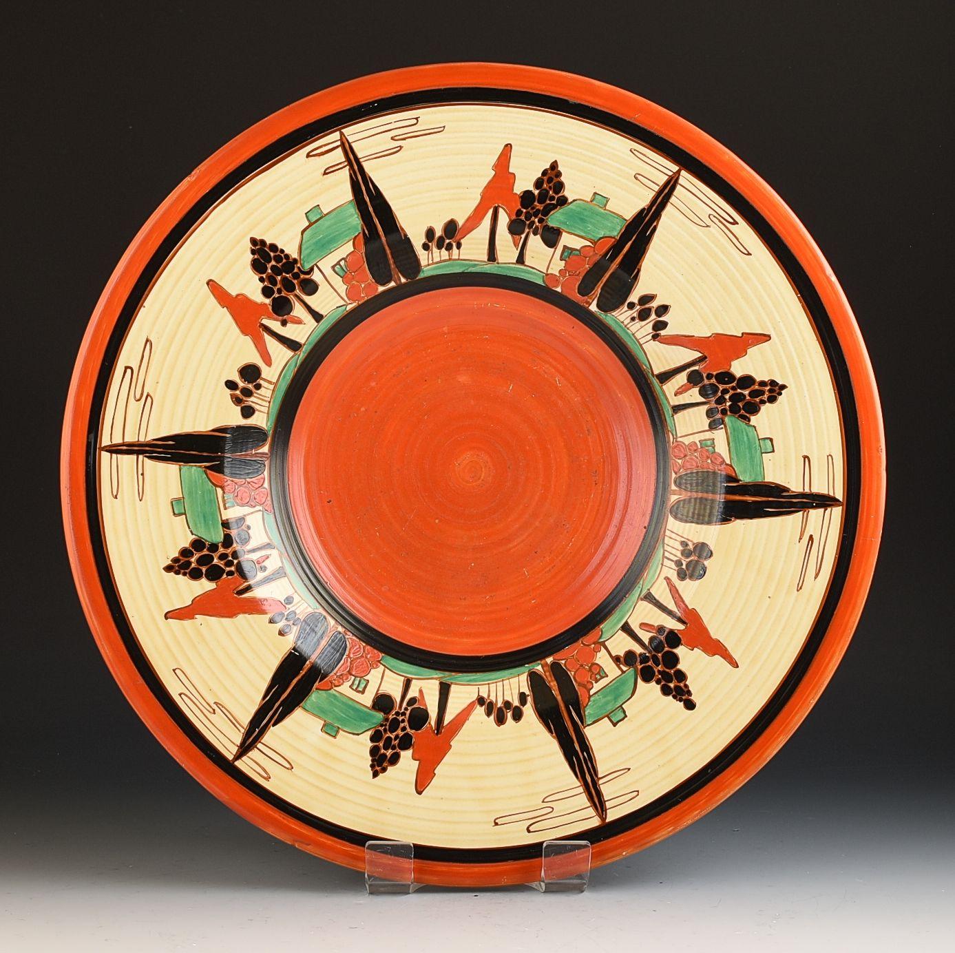 A fabulous and rare piece of Clarice Cliff dating to 1931, not seen for 30 years and the only charger known in this design. Beautifully decorated with a radial image with 6 repeating images! GUARANTEED to be free from damage or restoration this is a