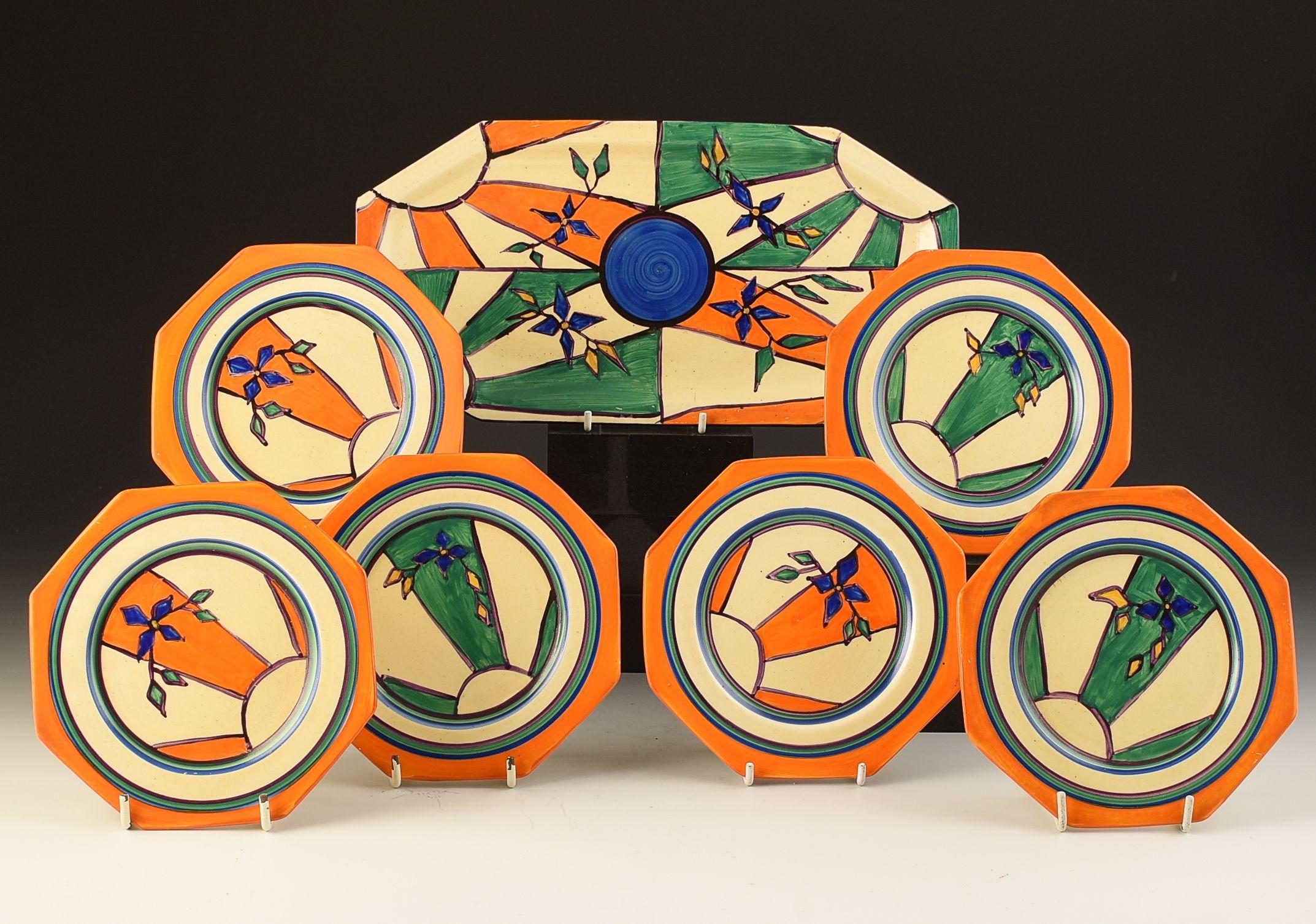 A fantastic sandwich set decorated in a superb version of sunray Leaves, the tray is amazingly decorated! Strong, bold colours and apart from one tiny mark on the back of a plate i can GUARANTEE to be free from damage or restoration. A really