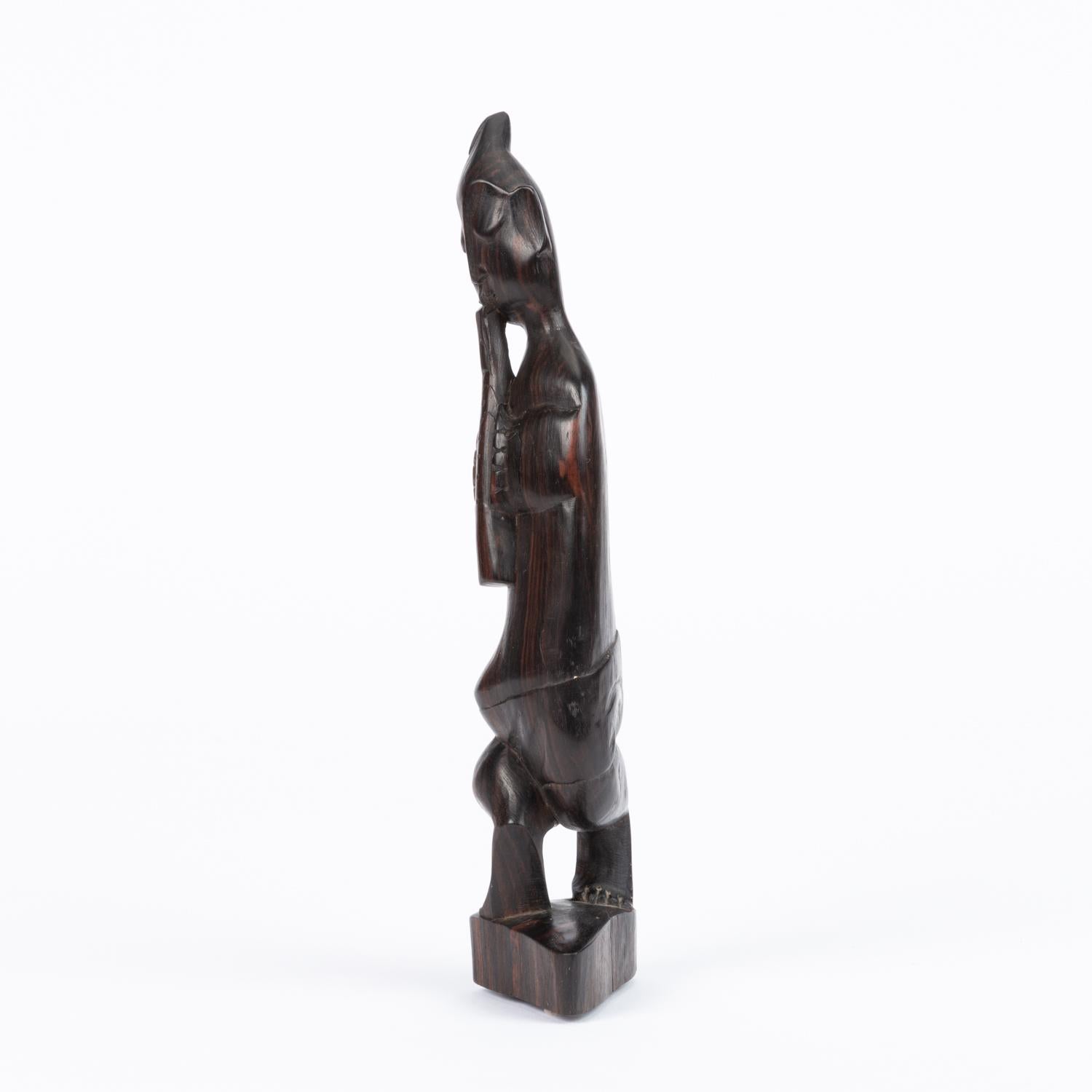 Unknown Clarinet Playing Rosewood Figurine