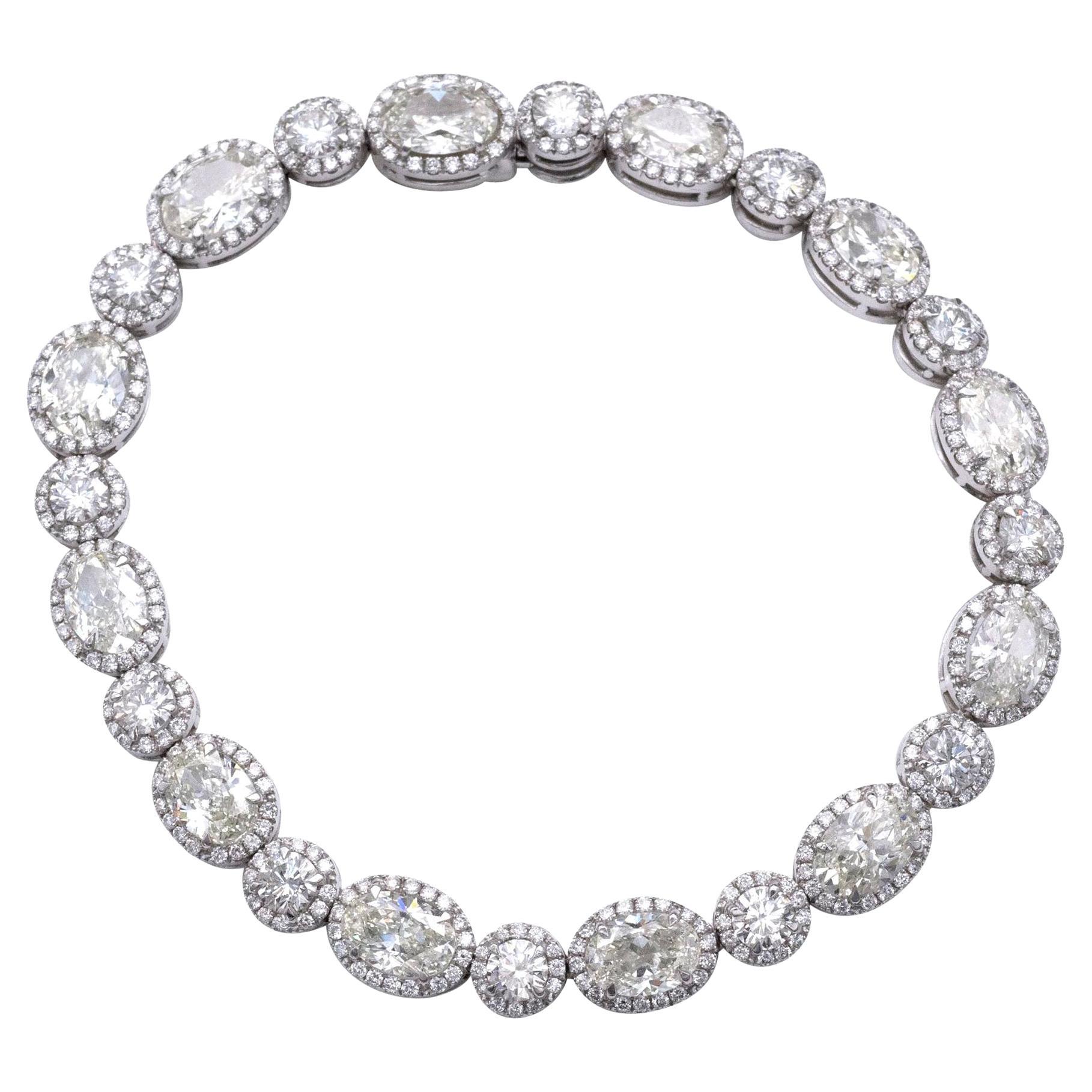Pulsera de tenis de oro de 18 quilates con diamantes ovalados y redondos de 13,36 quilates
