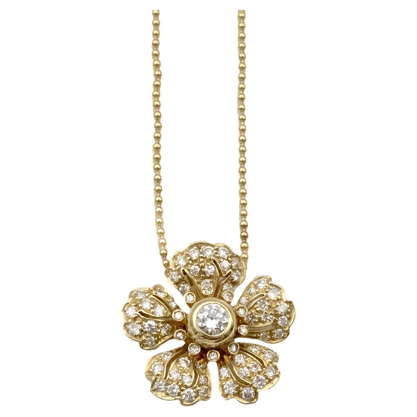 Claris.A Collier pendentif fleur en or jaune 18 carats et diamants