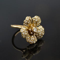 Claris.A Bague fleur en or jaune 18 carats et diamants
