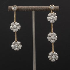 Pendientes colgantes florales de diamantes Claris-A de oro amarillo y blanco de 18 quilates