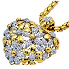 Claris-A Important Diamond and Gold Heart  of Flower Opera Necklace