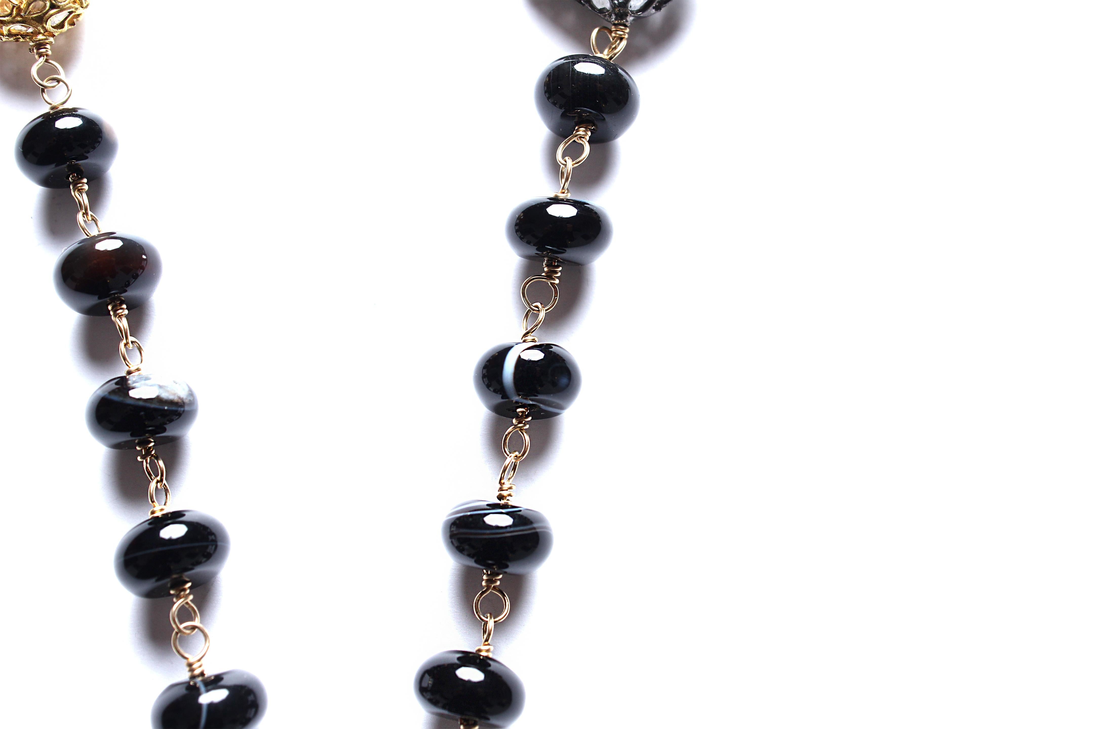 Rosary necklace consists of:
- 37