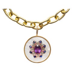 Clarissa Bronfman Ciondolo con perle e zaffiro ametista e catena d
oro a maglie larghe