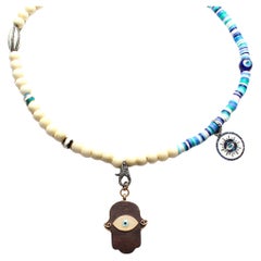 CLARISSA BRONFMAN Asymmetrische blau- elfenbeinfarbene Saphir-Diamant-Halskette & EbenholzHamsa