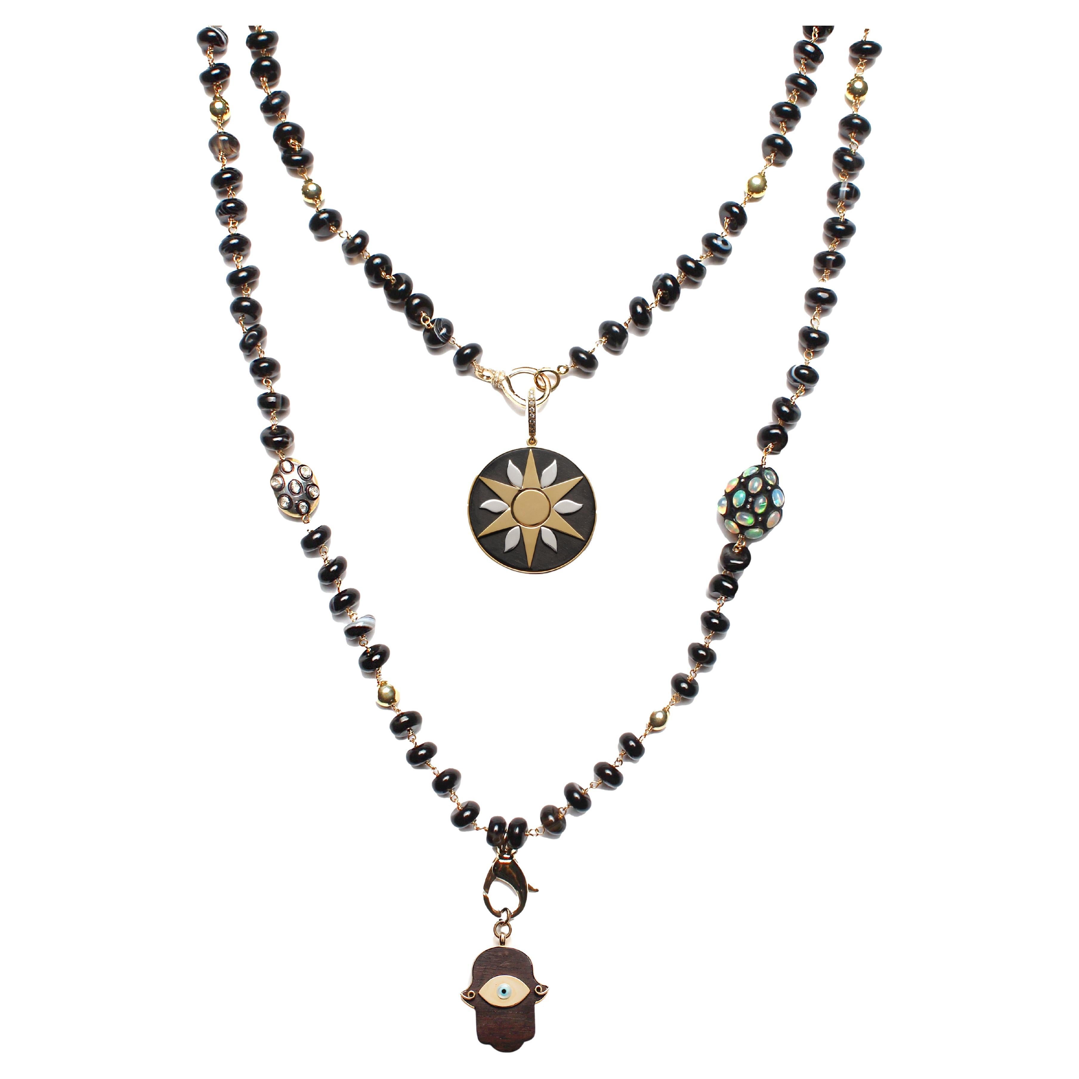 CLARISSA BRONFMAN Schwarzer Achat Carmen Halskette Ebenholz Sonnenstern Hamsa Hand-Anhänger