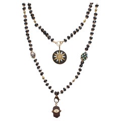 CLARISSA BRONFMAN Schwarzer Achat Carmen Halskette Ebenholz Sonnenstern Hamsa Hand-Anhänger