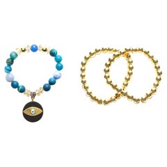 ClariSSA BRONFMAN Ensemble bracelet en or 14 carats, agate bleue, ébène, œil maléfique et 2 hématites