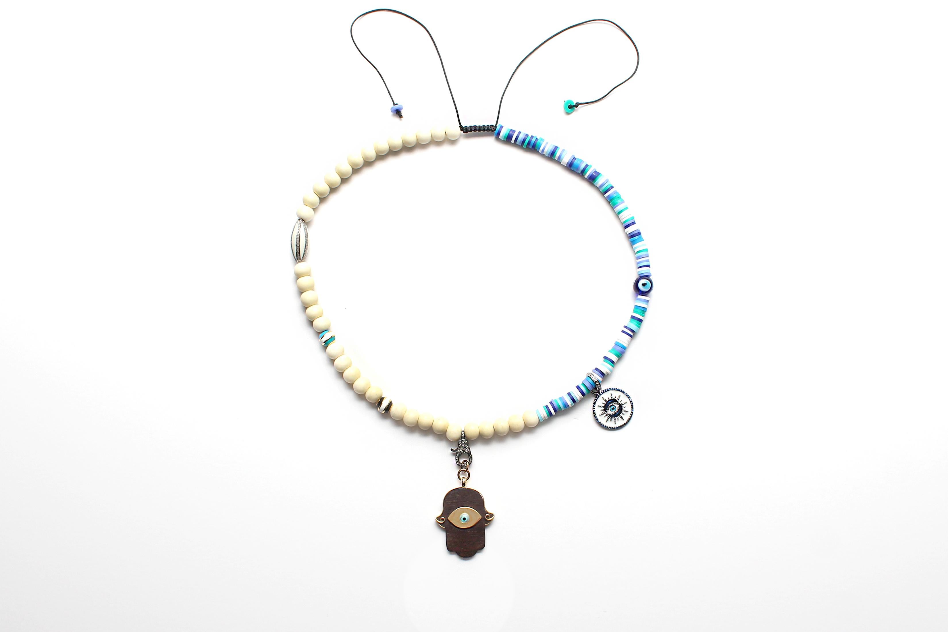 CLARISSA BRONFMAN Collar asimétrico azul y colgante estrella solar bicolor de ébano en Nuevo estado para la venta en New York, NY