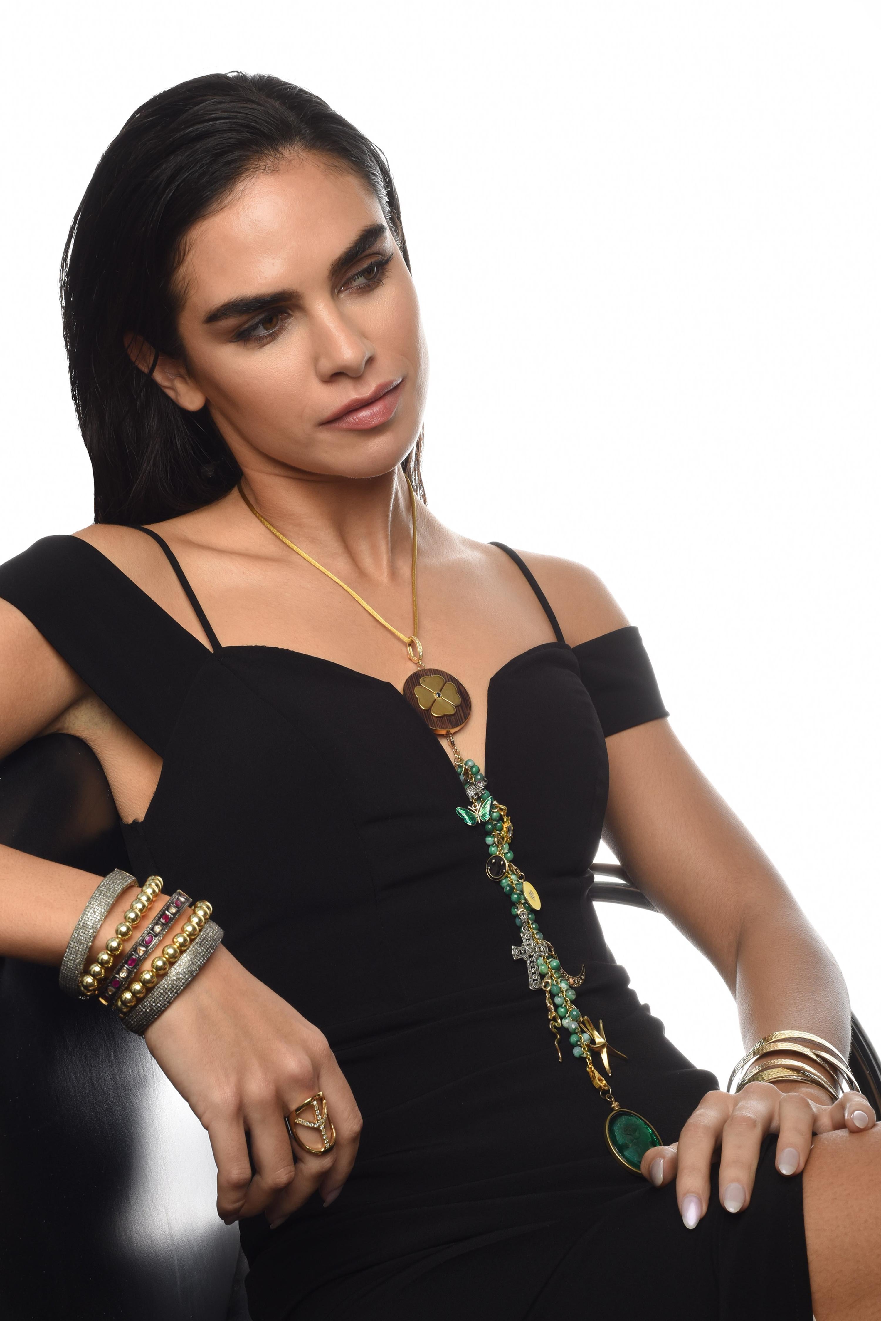 Our signature Symbol Tree Necklaces are each unique and made to be versatile. Attaches to 17 inch brown leather cord with Silver Auto Lock Clasp (included) so charms cascade down - top and bottom pendants can be removed so the piece can also be worn