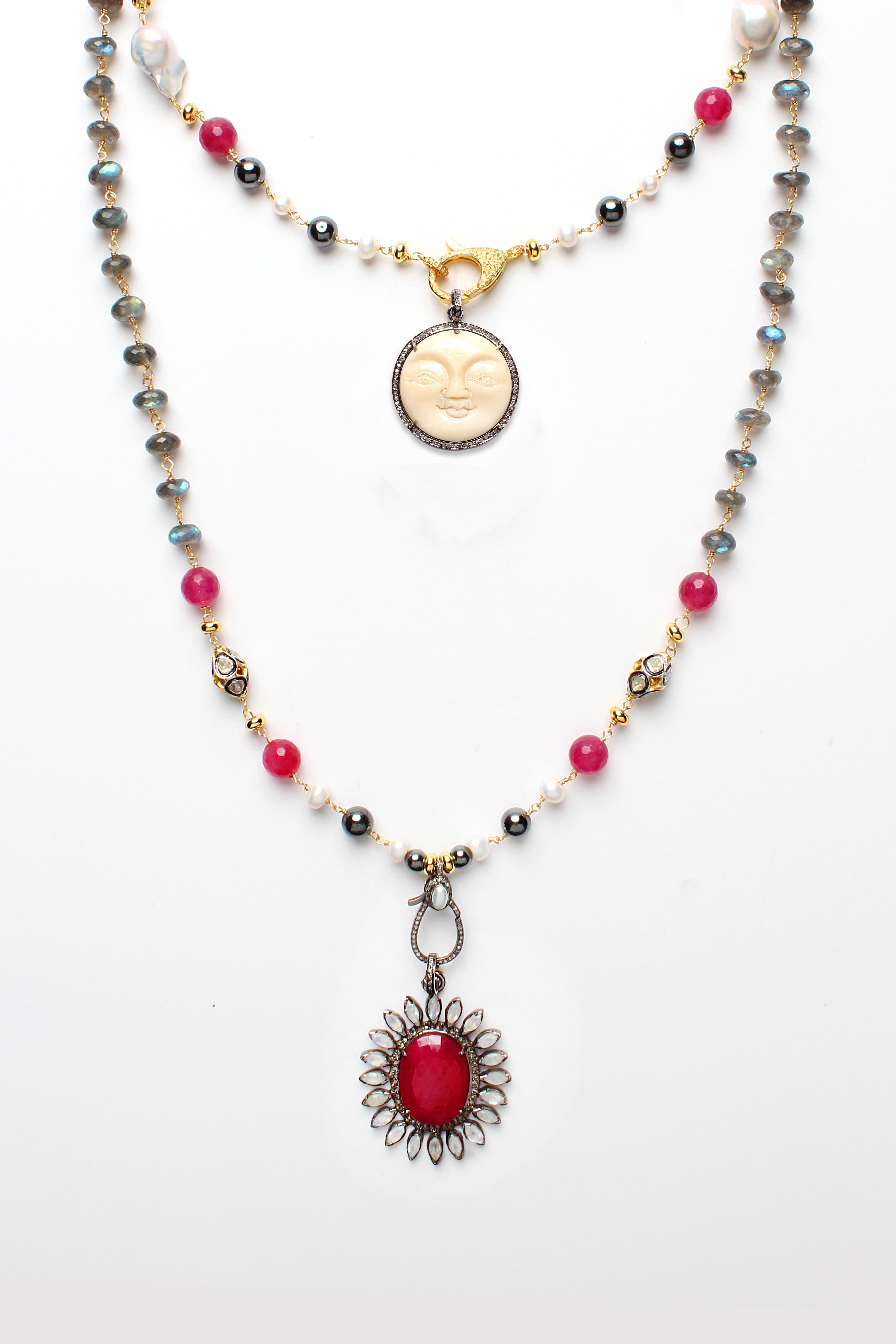 Carmen Necklace consists of:
- 9 MM FACETED ROUNDEL GRADE AAA+ LABRADORITE BEADS,
- HEMATITE 8 MM SMOOTH ROUND BEADS,
- 8 MM ROUNDEL PEARL BEADS,
- 21-24 MM FIREBALL PEARL BEADS,
- 12 MM FACETED RAW RUBY GRADE AAA+ BEADS, - SILVER GOLD PLATED