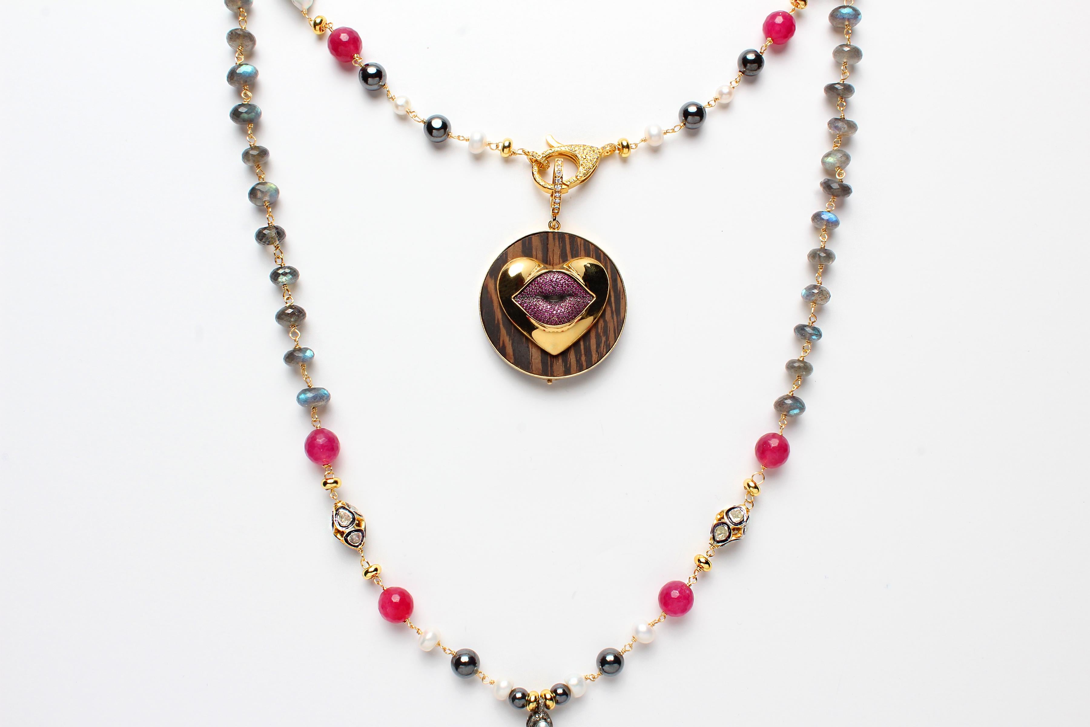 Carmen Necklace consists of:
- 9 MM FACETED ROUNDEL GRADE AAA+ LABRADORITE BEADS,
- HEMATITE 8 MM SMOOTH ROUND BEADS,
- 8 MM ROUNDEL PEARL BEADS,
- 21-24 MM FIREBALL PEARL BEADS,
- 12 MM FACETED RAW RUBY GRADE AAA+ BEADS, - SILVER GOLD PLATED