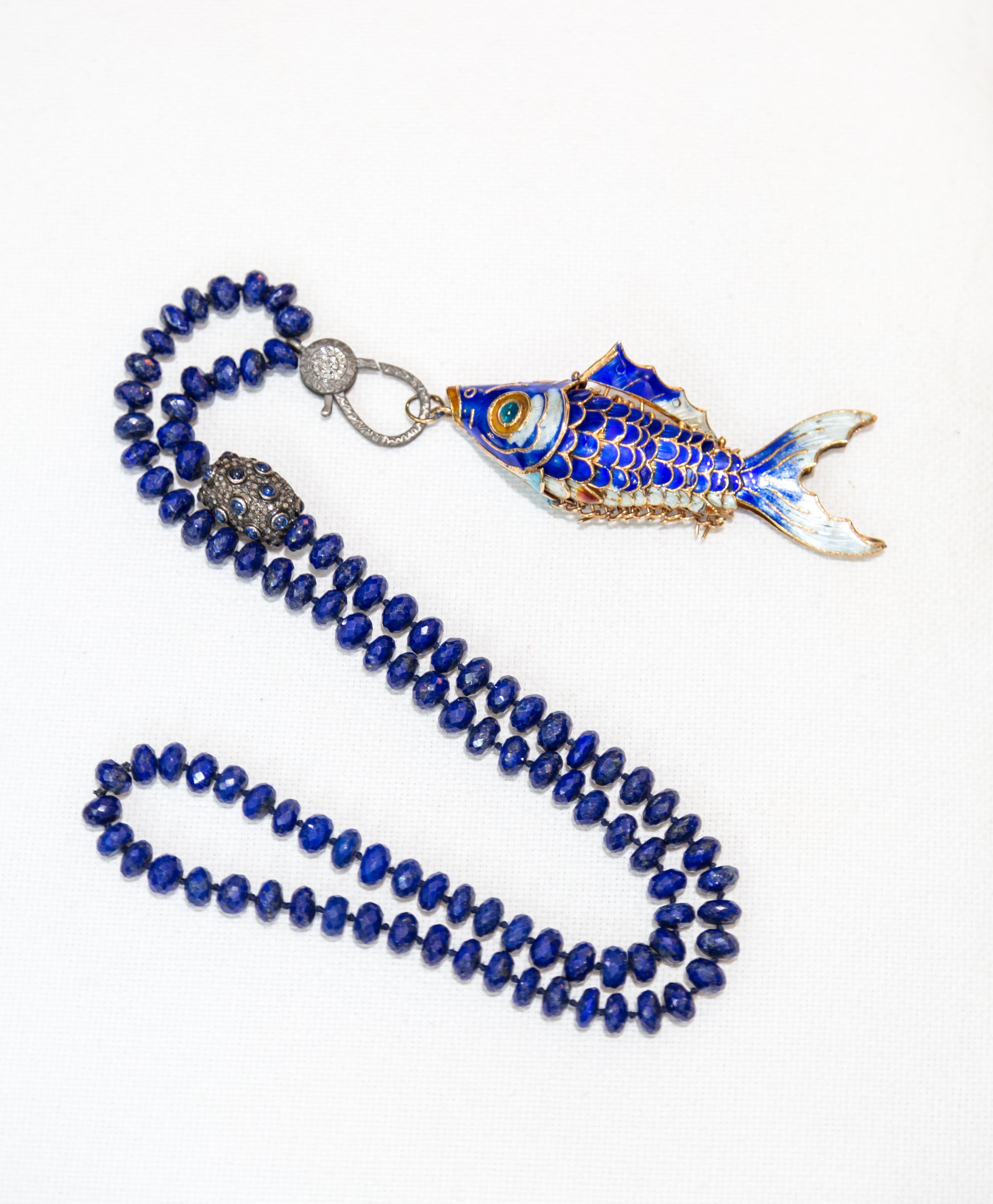Lapis beads, with diamond claps and diamond tumbler. Chinese fish pendant. Flexible pendant.
