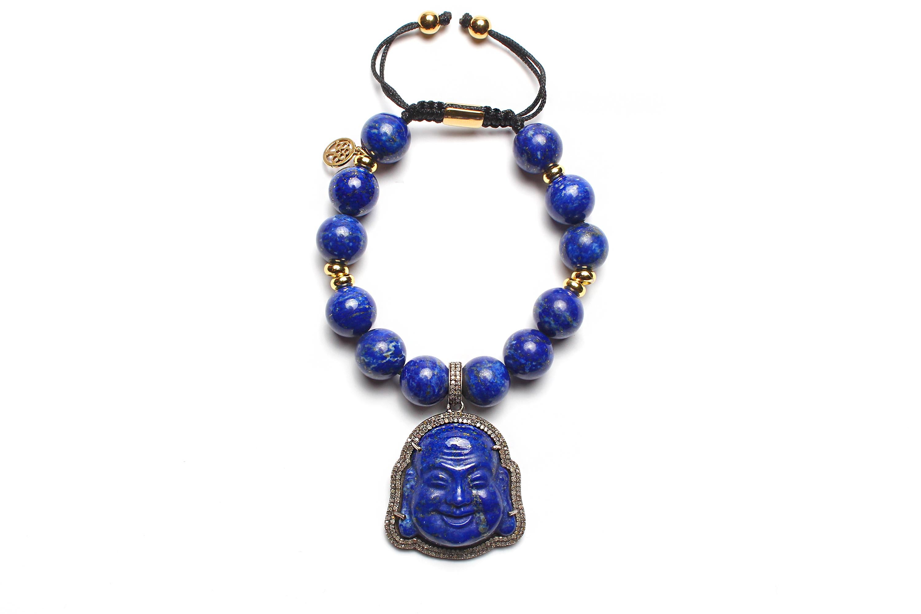 This beautiful zen bracelet with an adjustable cord is your perfect boho chic accessory!

- lapis lazuli grade AAA+ 12 mm round smooth beads
- 6 mm 14k gold small spacer beads
- blue lapis lazuli 925 sterling silver pave diamond buddha charm
- size