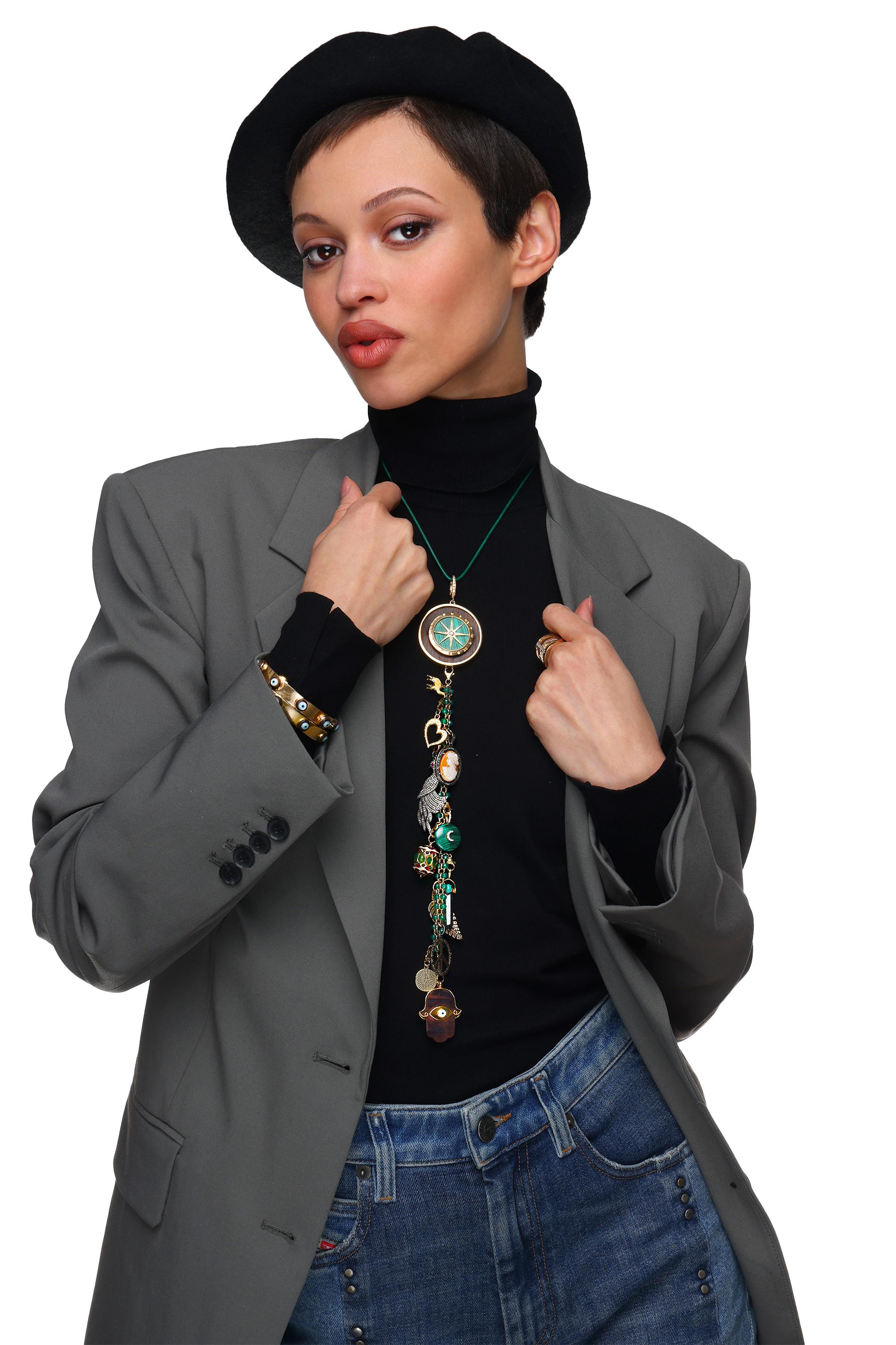 Clarissa Bronfman Signature Ebony pendants are an emblem that embody the collection as a whole.

They are versatile for formal/casual wear. They come with signature otto locks on top that are 12mm allowing them to fit around various cords,