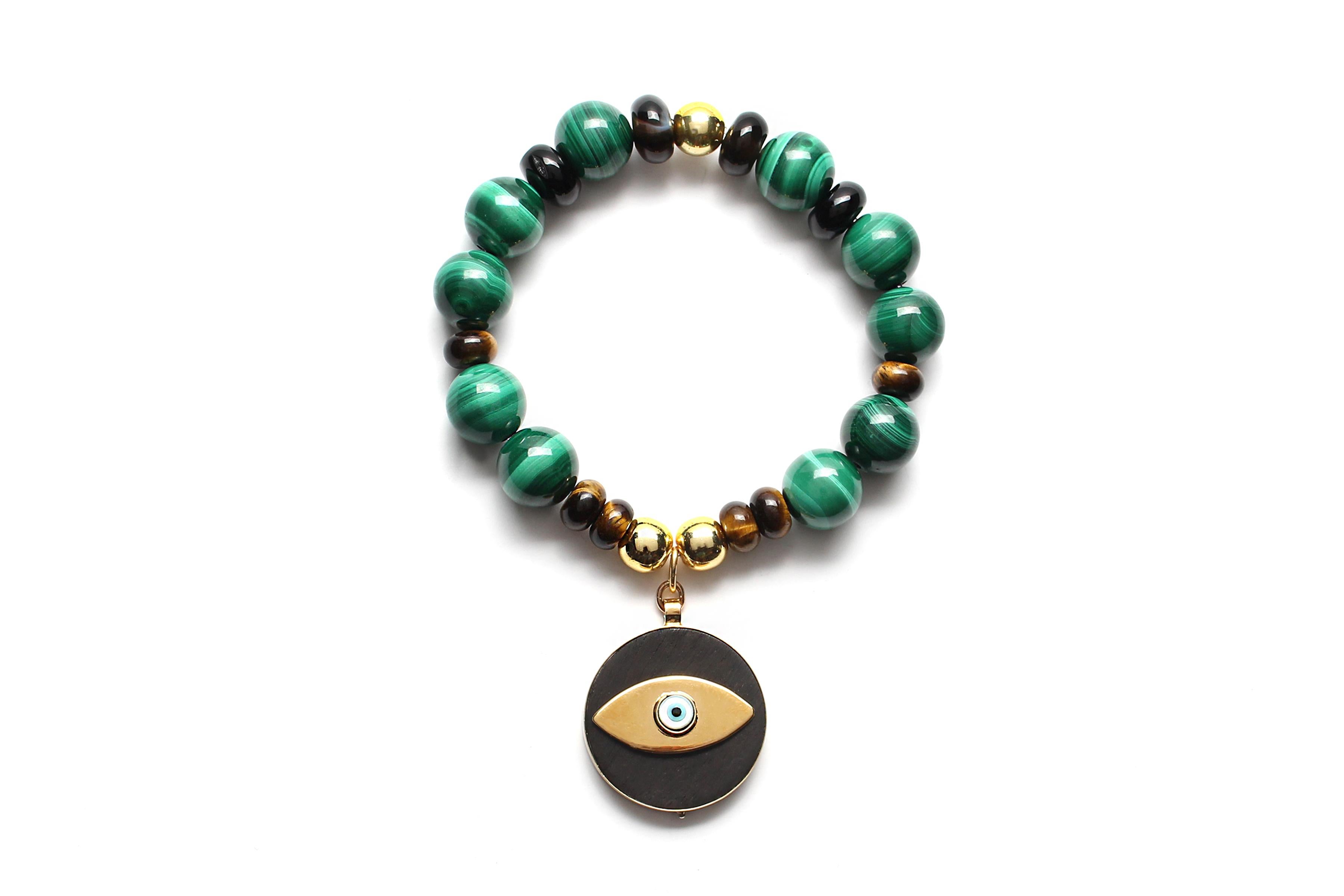 A new version of our Signature Evil Eye Beaded Bracelets, bringing in the element of Malachite, and Black Smoky Agate Beads into the mix.

This bracelet serves perfectly to be worn for all seasons and pairs perfectly with so many pieces from our