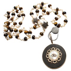 Clarissa Bronfman Mother of Pearl Ebony, Gold Pendant & Pearl Tiger's Eye Rosary