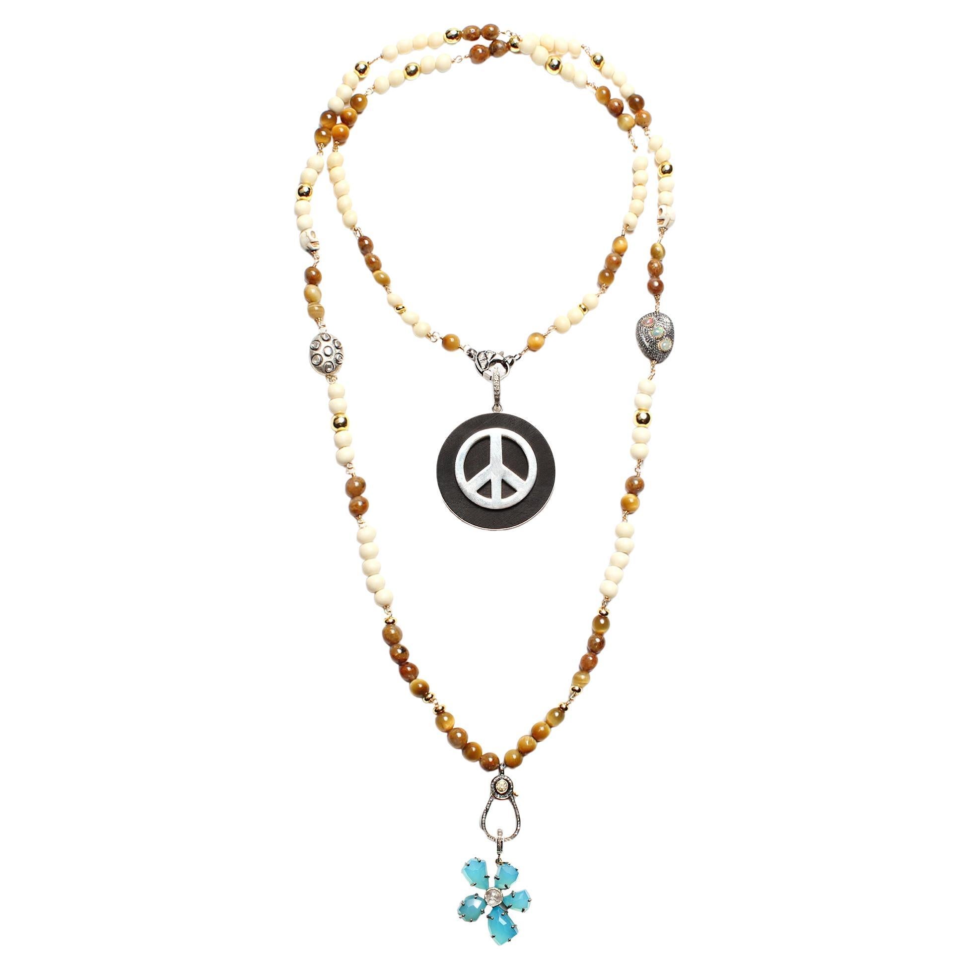 CLARISSA BRONFMAN - Collier Carmen en os de tigre avec diamants et fleur de paix en ébène