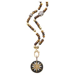 Clarissa Bronfman Halskette mit Sonnenstern-Ebenholz-Anhänger, Tigerauge Polki Diamant Gold