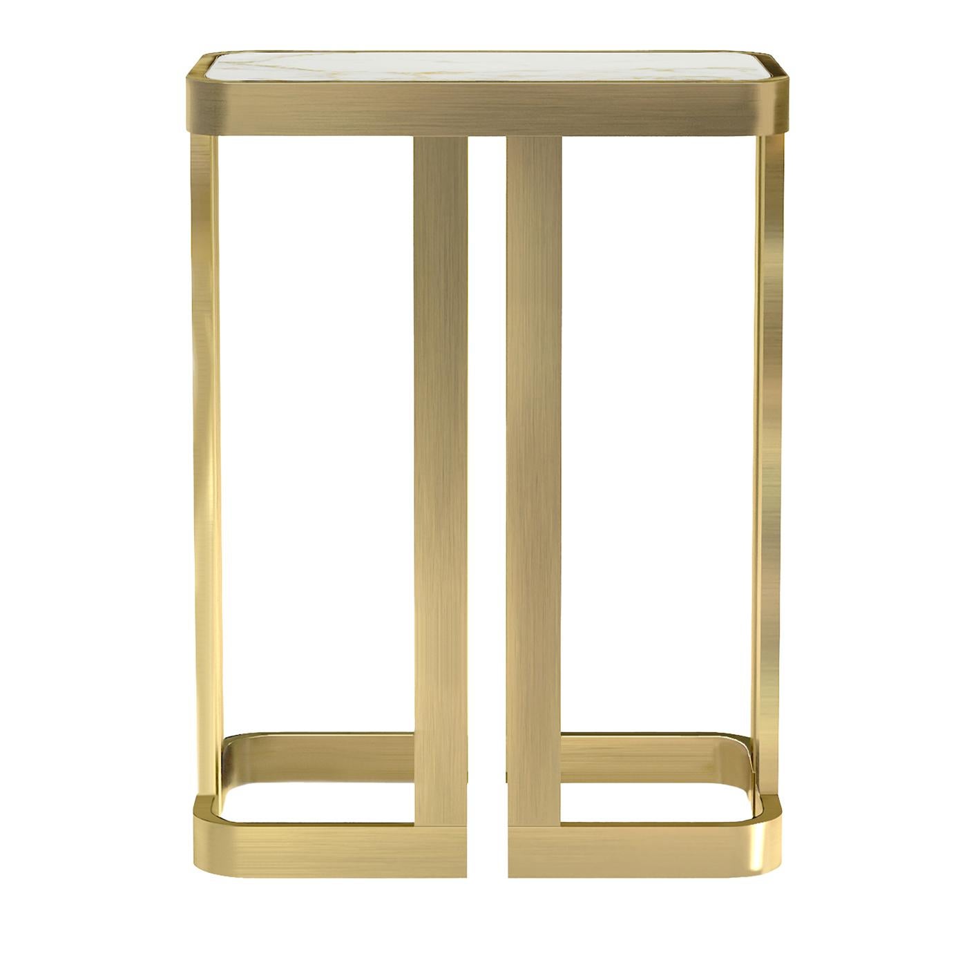 The supporting structure of this magnifiscent piece, designed by Studio 63 for Marioni, is crafted entirely in brass and forms a striking geometric pattern. Its top features one long slab of marble, which is imbedded into the brass structure making