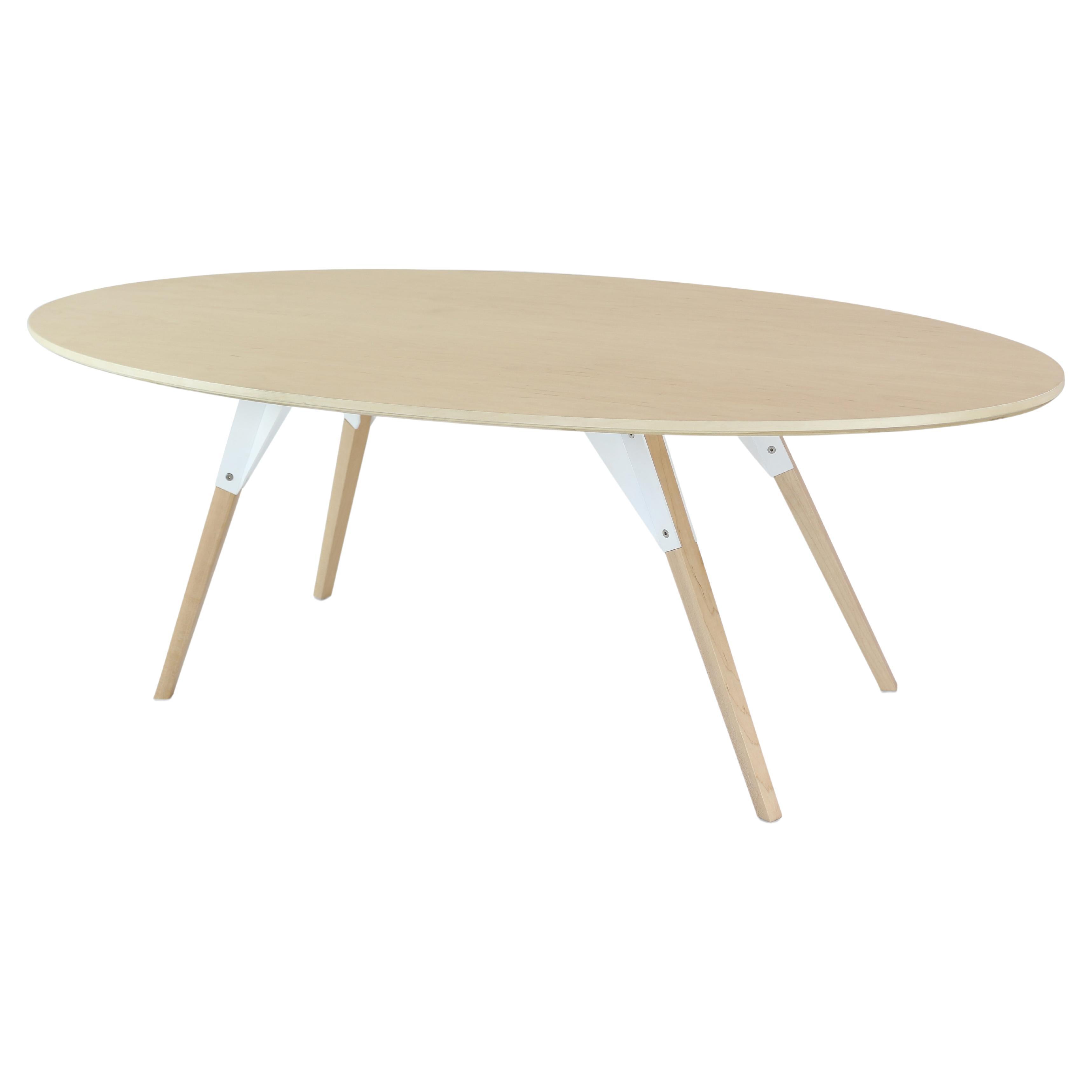 Clarke Industrial Coffee Oval Table Maple White For Sale