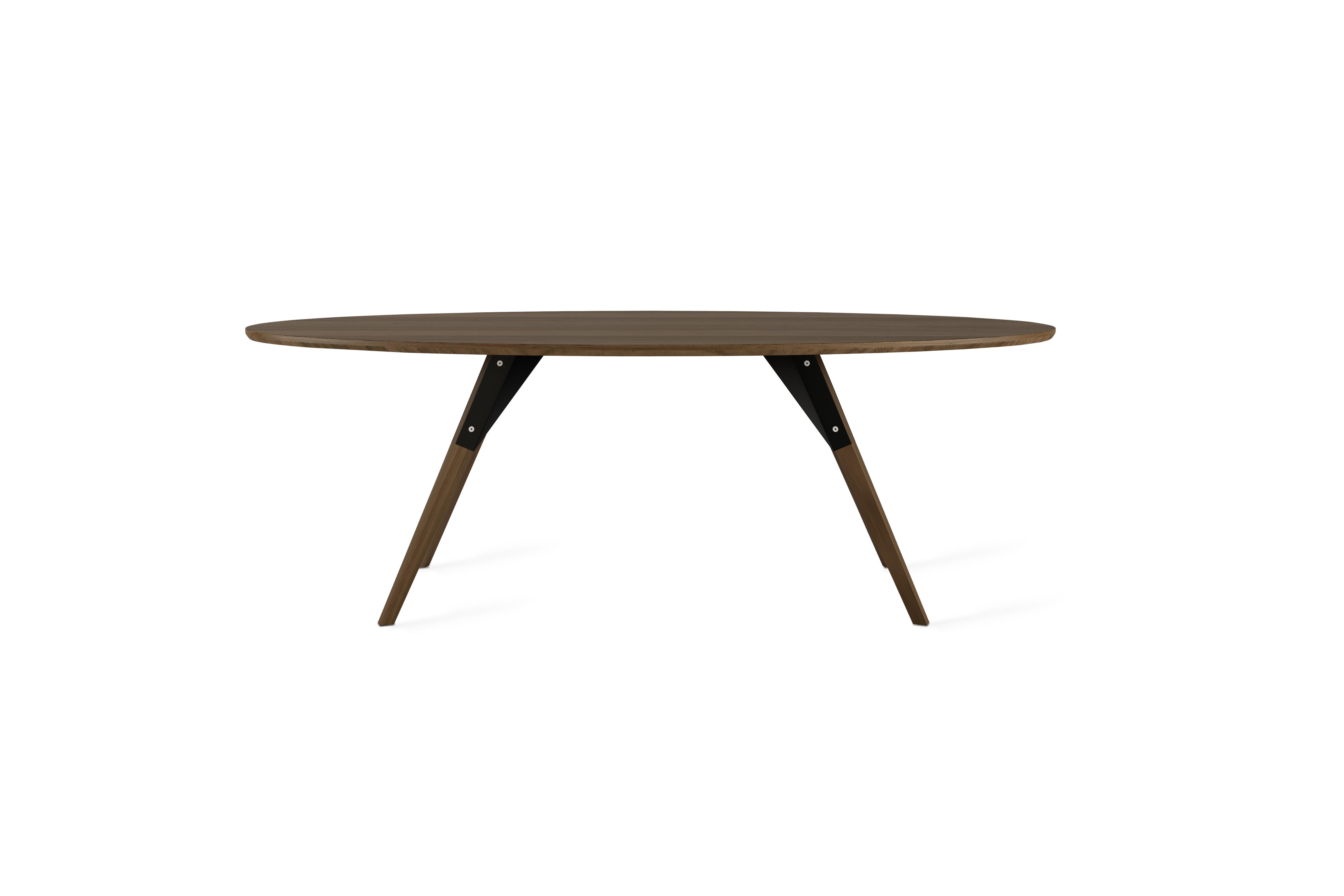 The Clarke Collection comes in ten different table top sizes, two wood species, and two metal finishes. The exposed stainless steel bolts blur the line between Scandinavian and Industrial styles.
 