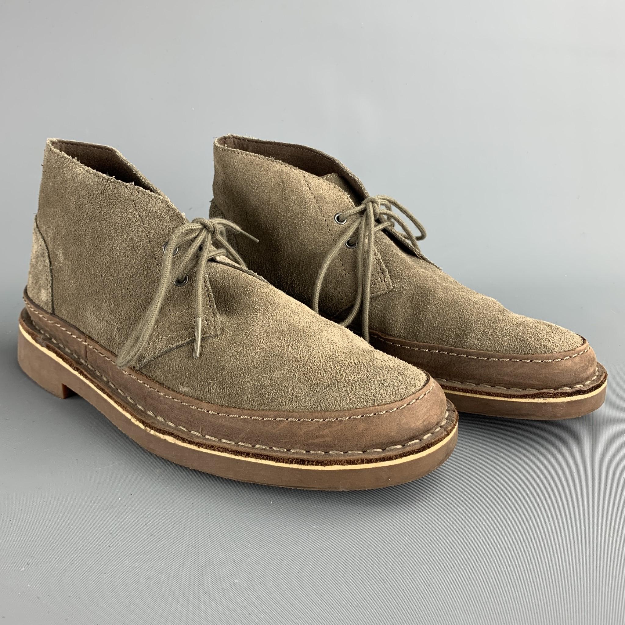 CLARKS boots comes in a taupe suede with contrast stitching featuring a chukka style and a lace up closure. As-Is.

Good Pre-Owned Condition.
Marked: 7 M

Outsole:

11 in. x 4 in. 
SKU: 88066
Category: Boots

More Details
Brand: CLARKS
Size: