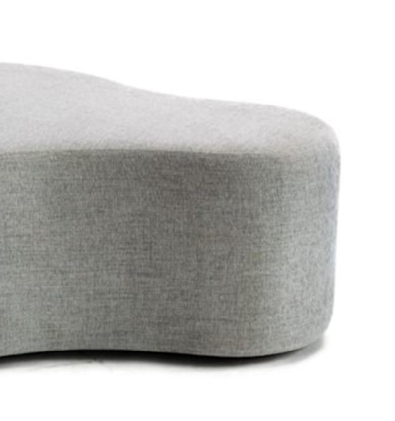 Fully upholstered, amorphous shaped ottoman with organic curves - (1) of (3) shape options. The Clarkson Ottoman frame is constructed using solid maple wood. Available in four cotton fabric options or can be upholstered using customer's own