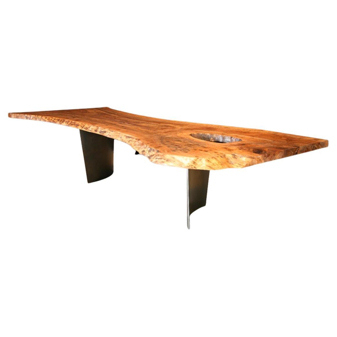 Organic Claro Walnut Dining Table with Curved Patina Legs For Sale