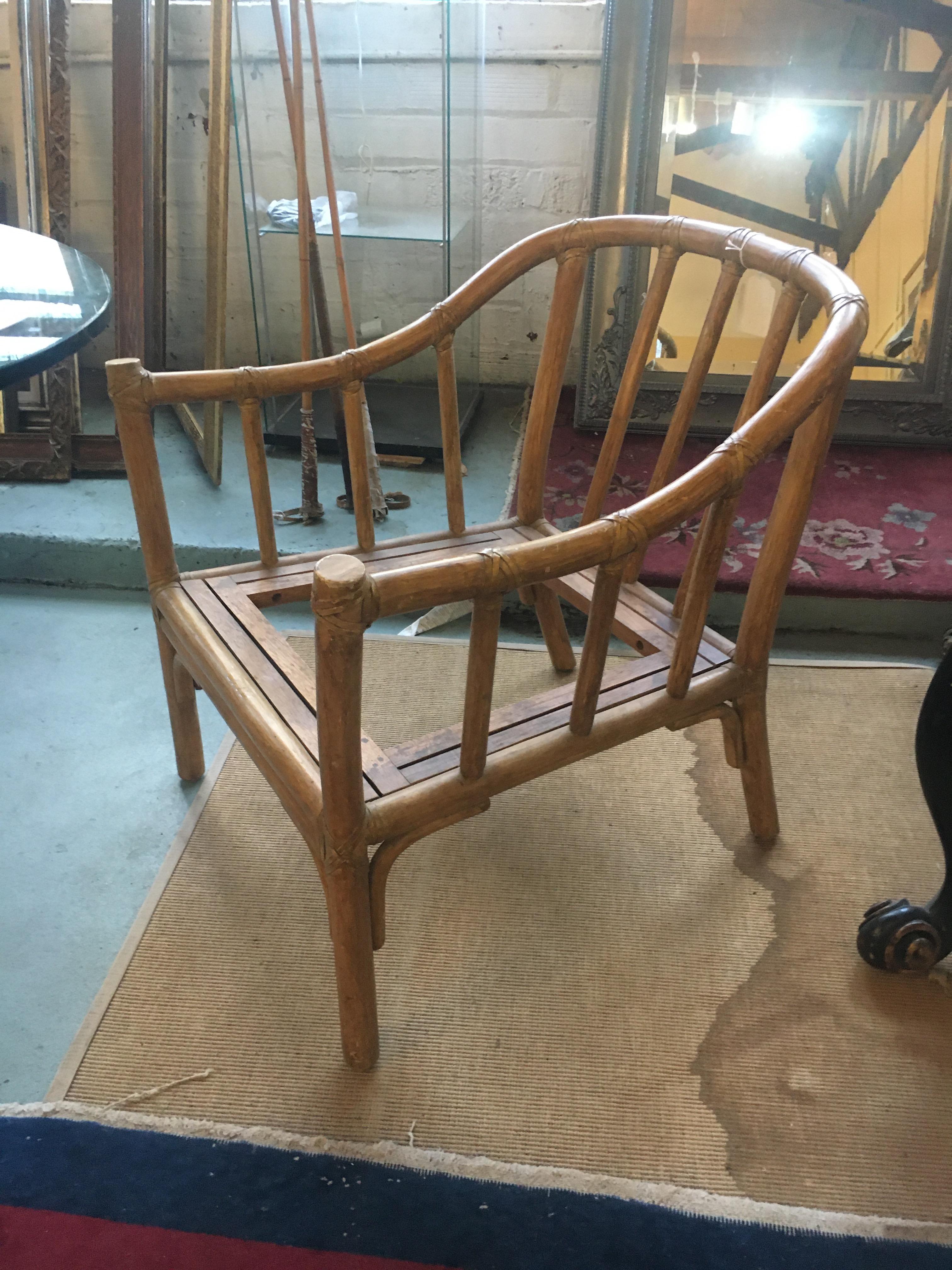 Classic set of four Mcguire club chairs. Great scale for comfort. All chairs share the iconic McGuire leather strap wrappings. All of the chairs are in very good to excellent condition and are signed with the McGuire tag. We only have two left with