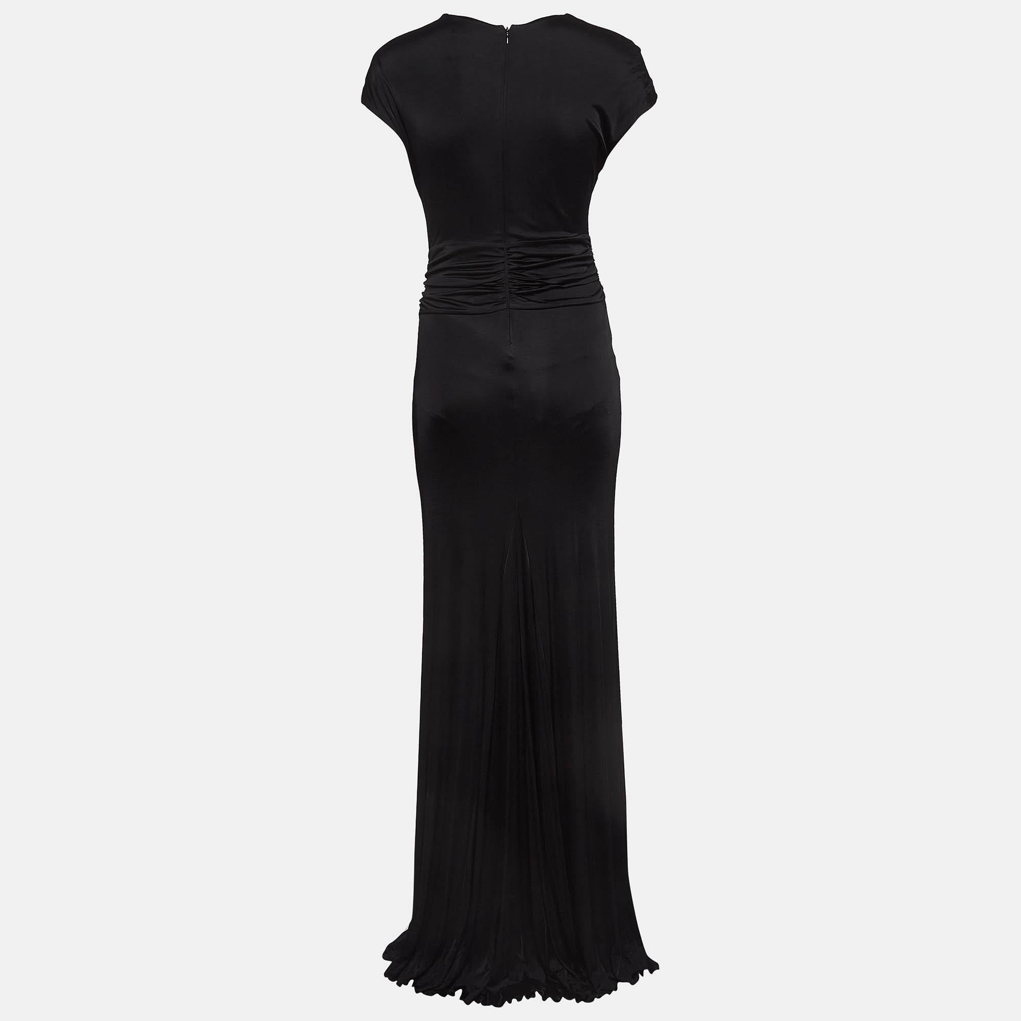 Zeigen Sie einen stilvollen Look, indem Sie dieses schöne Designerkleid tragen. Dieses aus feinem Stoff geschneiderte Kleid hat eine schicke Silhouette, die den Körper umspielt. Stylen Sie die Kreation mit schicken Accessoires und Pumps.