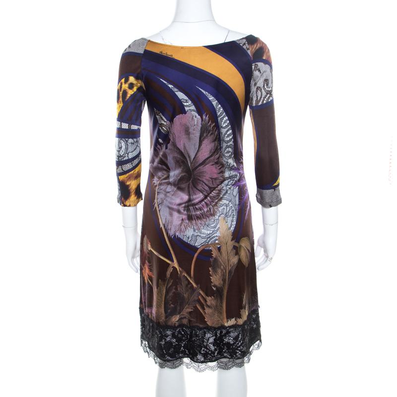Make a fantastic style statement by pairing this Class by Roberto Cavalli dress with off-beat accessories. It features 3/4th sleeves, a boat neckline and prints all over. Quality fabrics have been cut masterfully to create a masterpiece like this