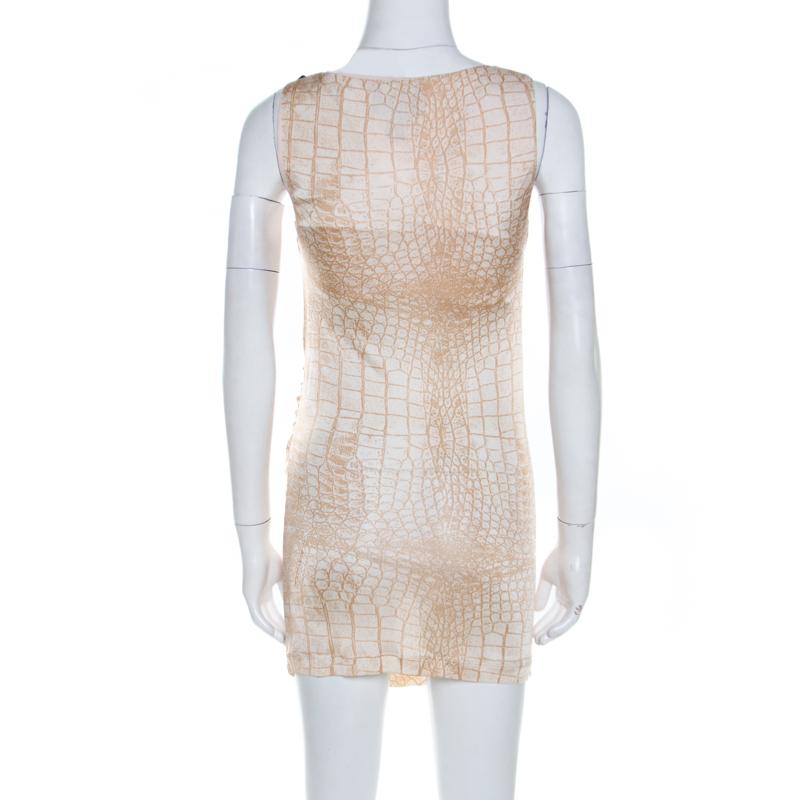 This attractive piece comes from Class by Roberto Cavalli in a subtle beige. This ruched fitted dress will lend an additional touch of panache to your attire. Crafted from blended fabric, this creation features a snakeskin printed design and a