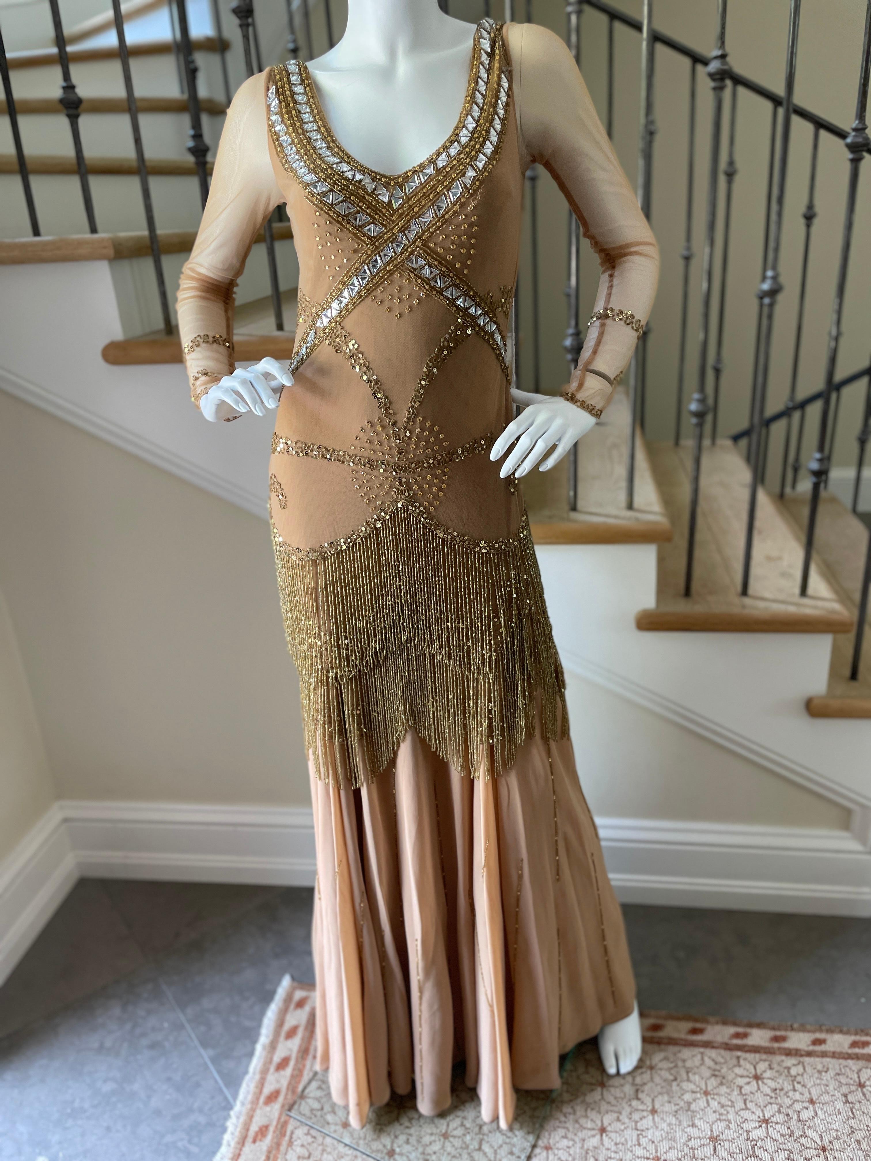 Class Cavalli Extravagantly Jeweled Vintage Evening Dress with Beaded Fringe.
This is remarkable, please use the zoom feature to see the details.
This is rather heavy as the bead fringe is glass beads, and the crystals are also glass, causing it to