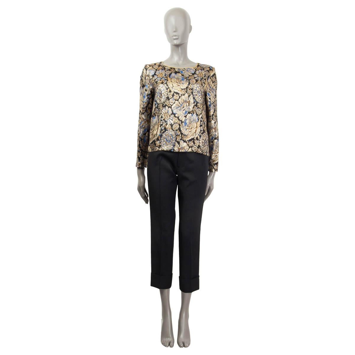 100% authentic Class By R.Cavallie floral jacquard blouse in gold, black, camel and blue acetate (93%) and metallised fiber (7%). Features a self-tie bow at the back and long sleeves. Opens with a zipper at the side. Lined in black polyester (100%).
