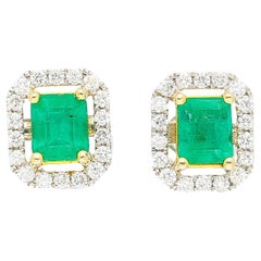 Classic 1 Carat Natural Emerald and Diamond Halo Stud Earrings in 18k White Gold