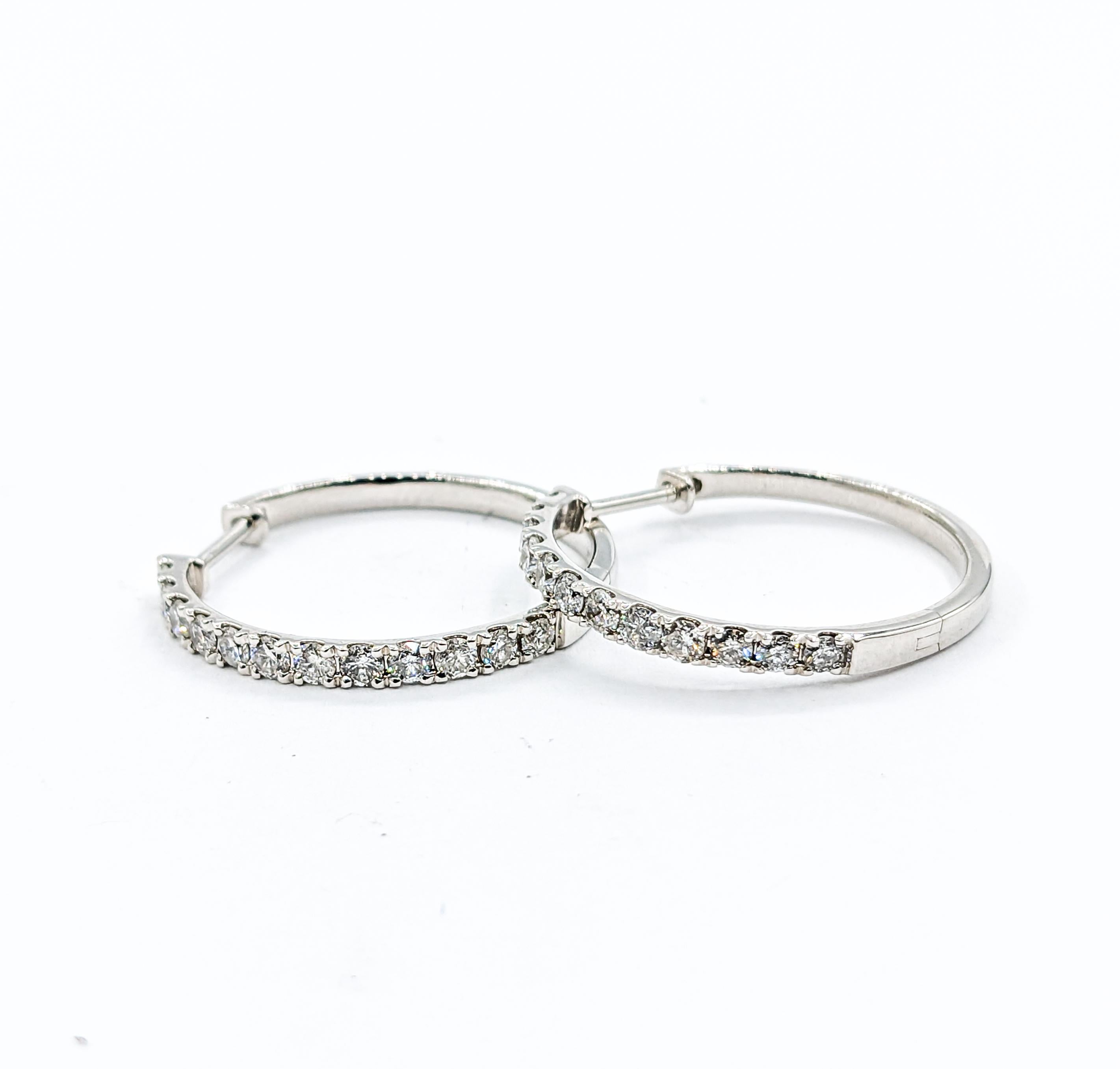 Classic 1.00ctw Round Diamond Hoop Earrings

Presenting our exquisite hoop earrings, meticulously crafted in 10k white gold, adorned with a dazzling display of 1.0c0tw round diamonds. These mesmerizing diamonds boast an impressive I clarity and near